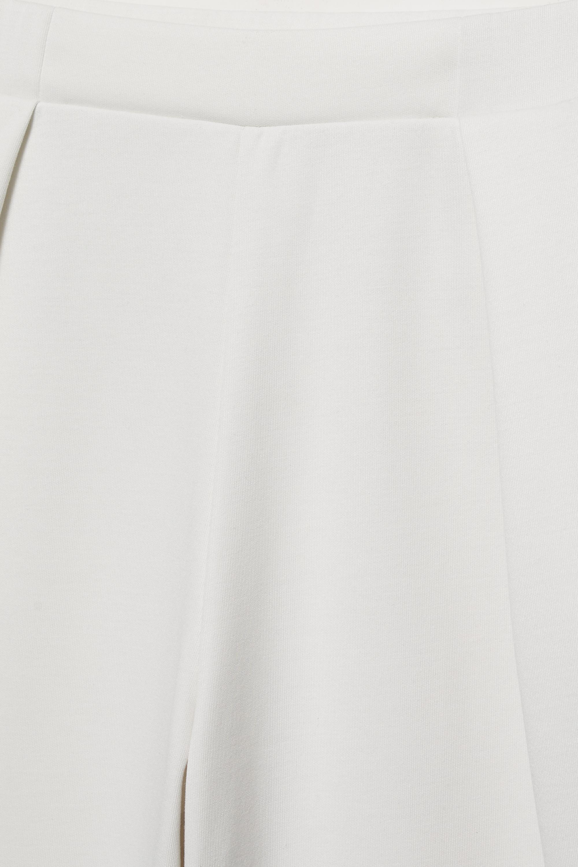 Soft-touch wide-leg darted trousers — Ecru