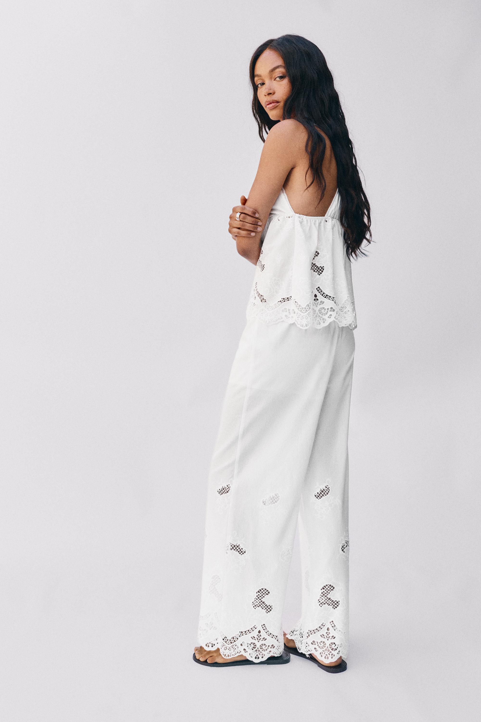 White trousers with Swiss embroidery — White
