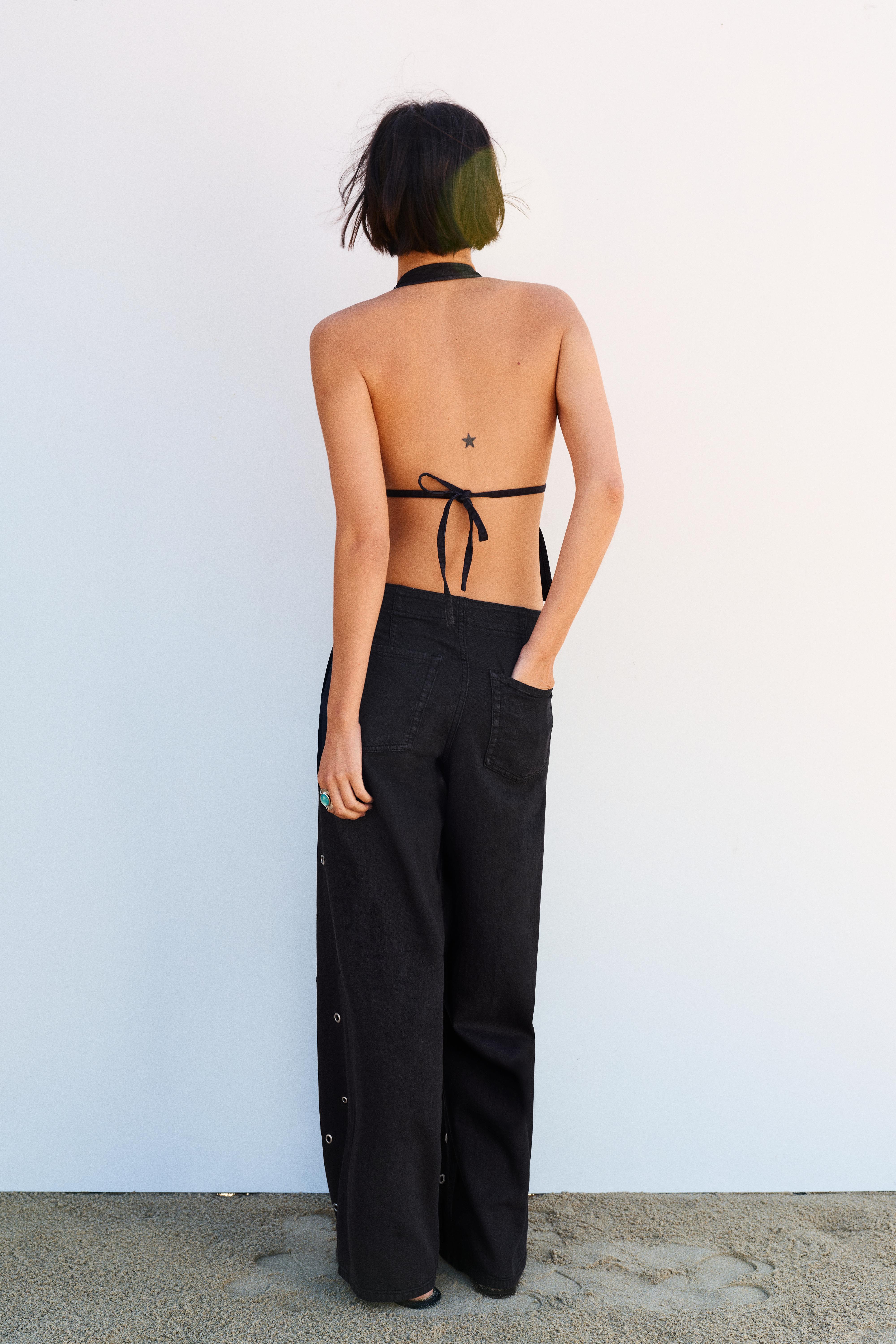 Straight-leg jeans with eyelets — Black