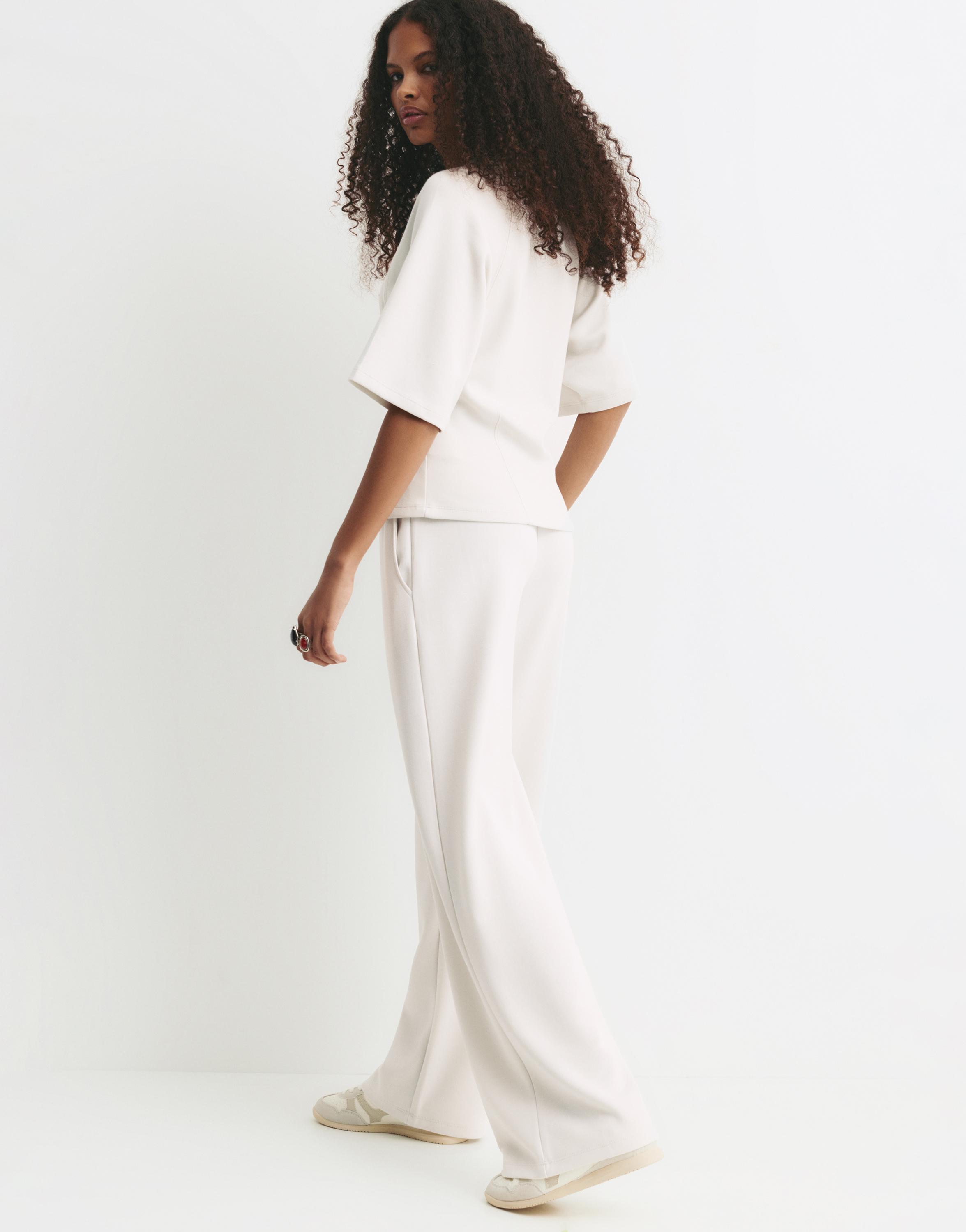 Soft-touch wide-leg trousers — Ecru