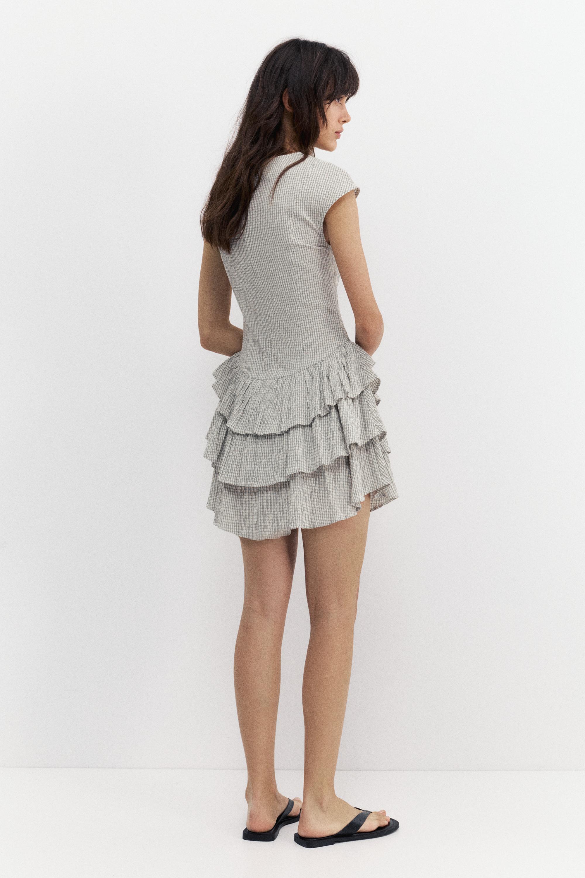 Short checked dress with ruffled hem — Ice