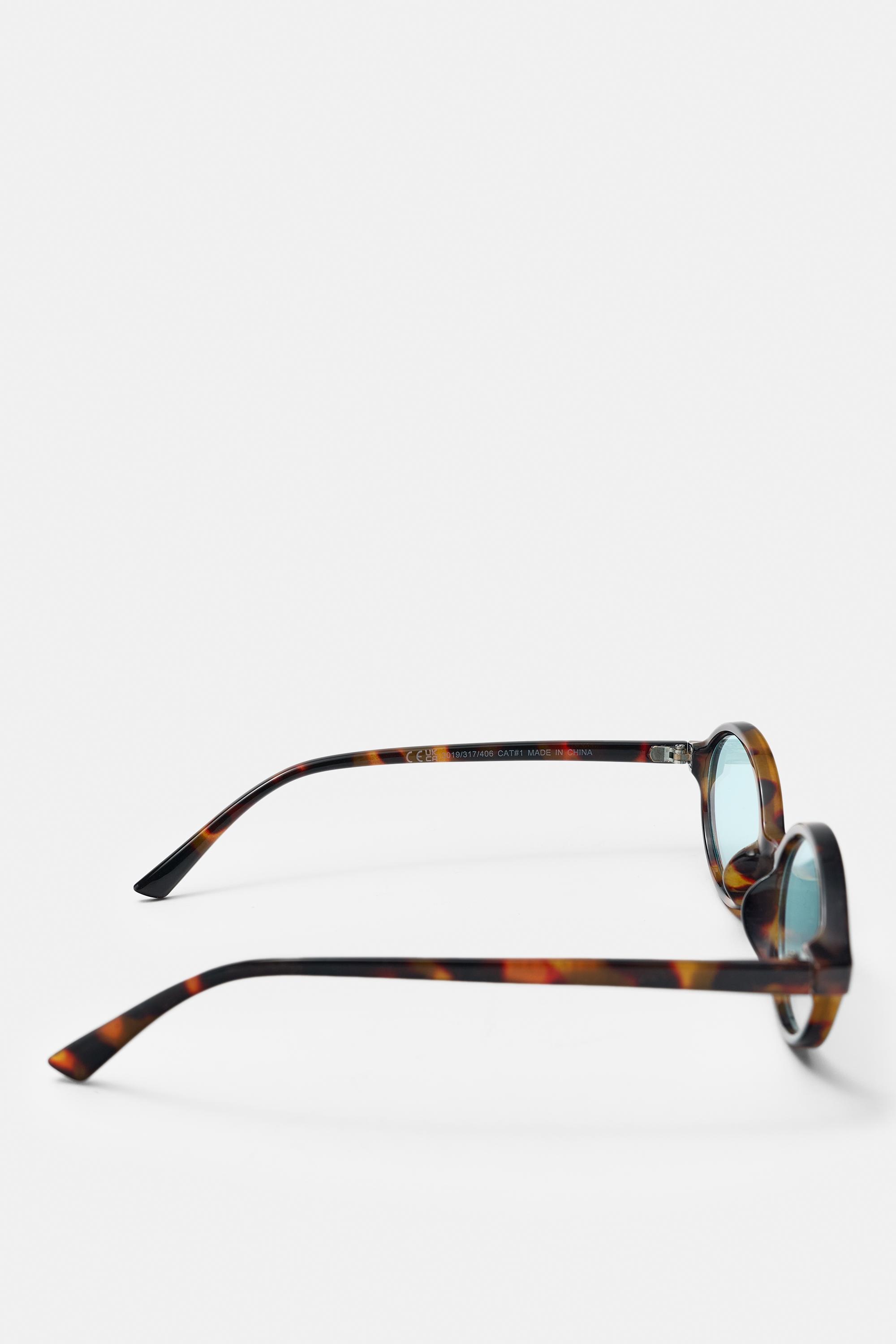 Oval sunglasses — Pale blue