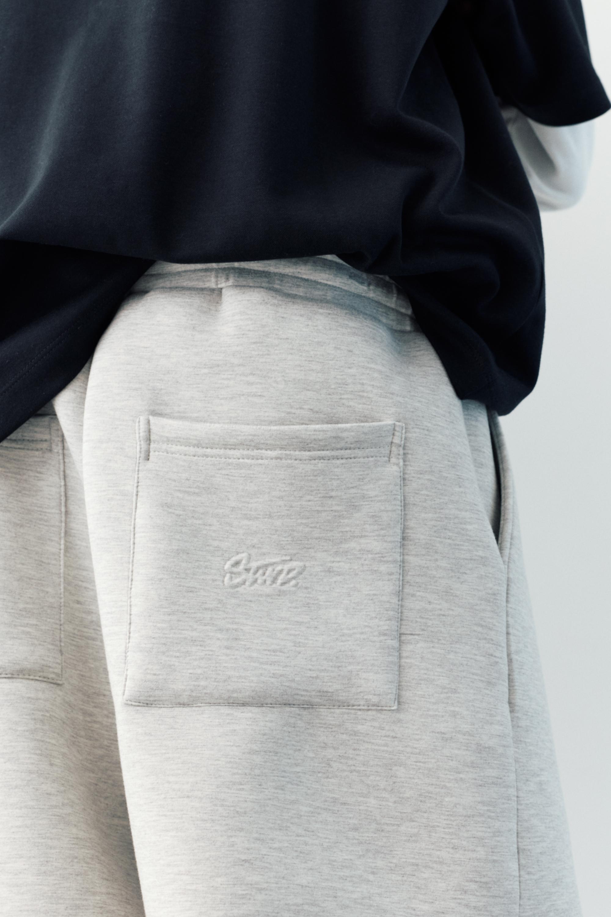 Balloon fit tracksuit bottoms — Grey marl