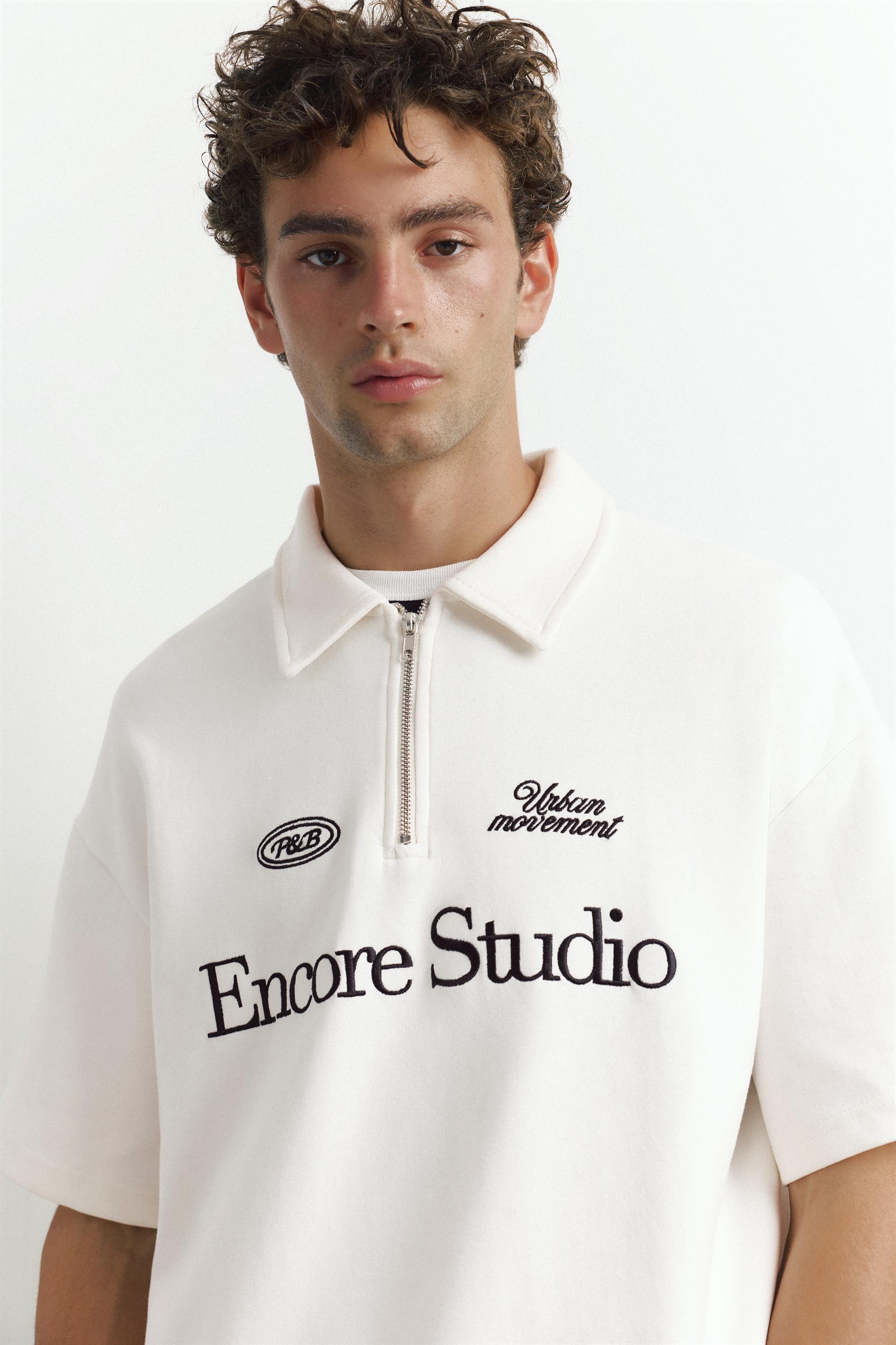 Graphic zip-up interlock polo shirt — Off white