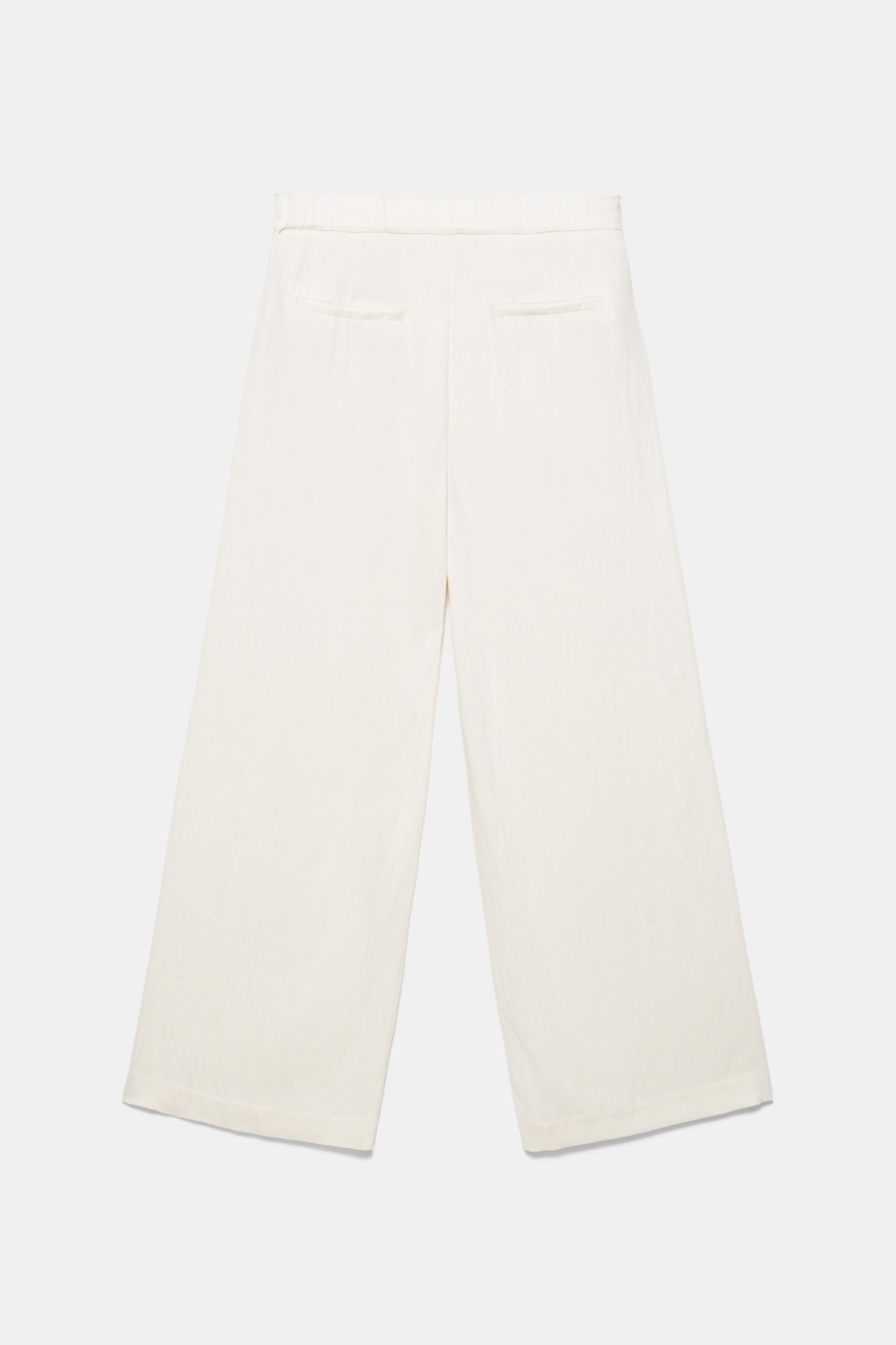 Düğmeli ve fermuarlı, kemer tokalı, önü pensli, elastik belli, tailored fit pantolon. - Görsel 20