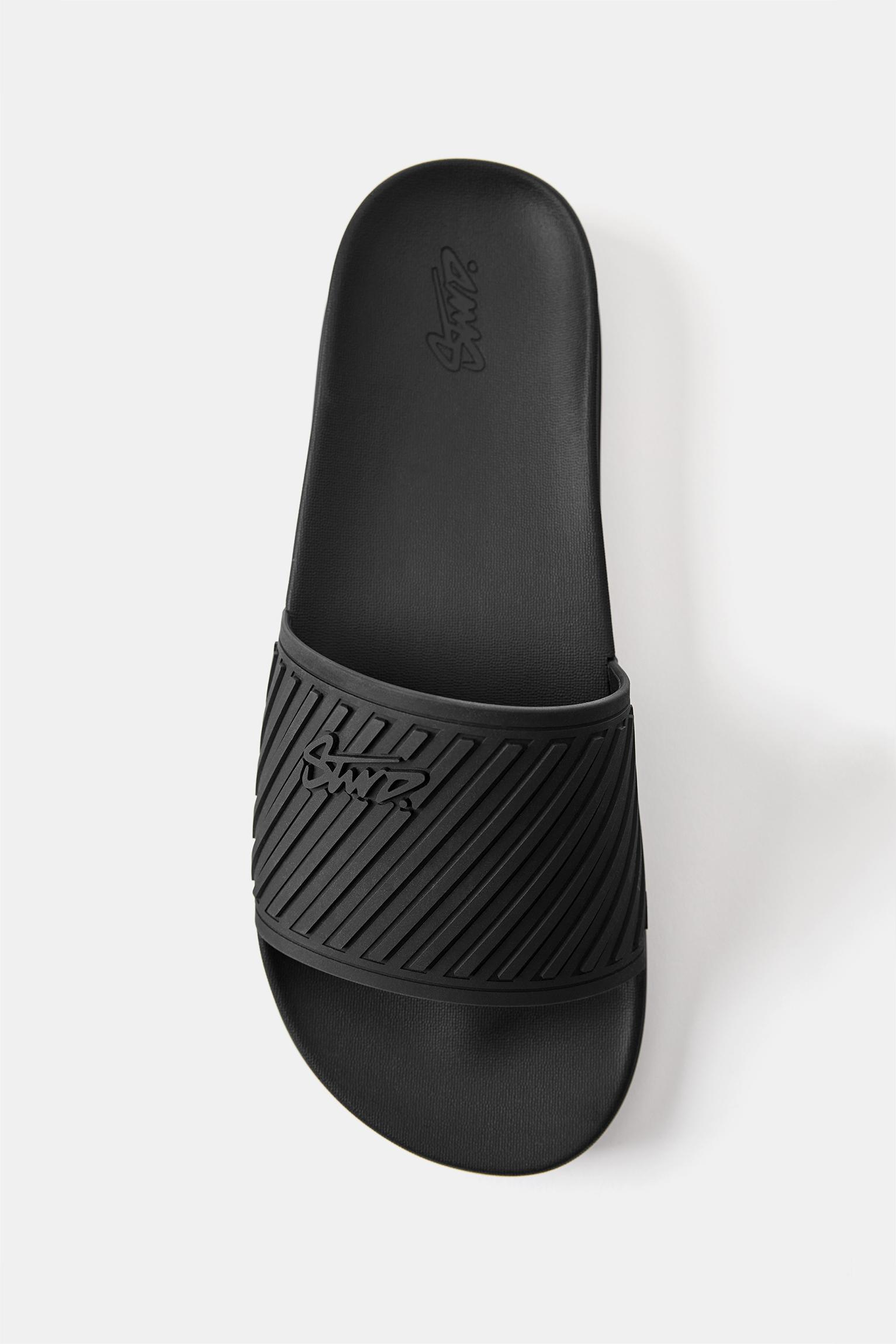 STWD rubberised sandals — Black