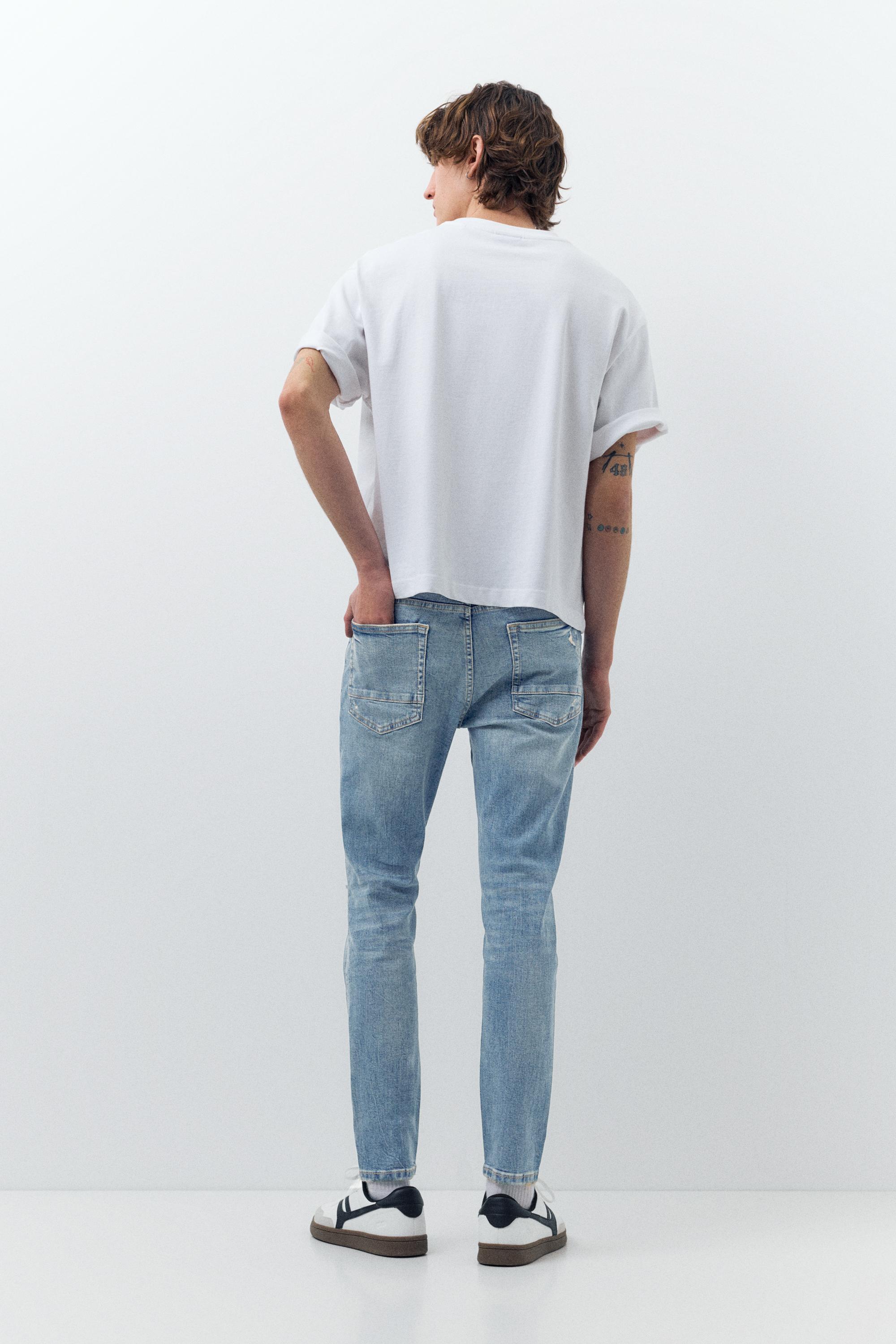 Ripped skinny jeans — Medium blue