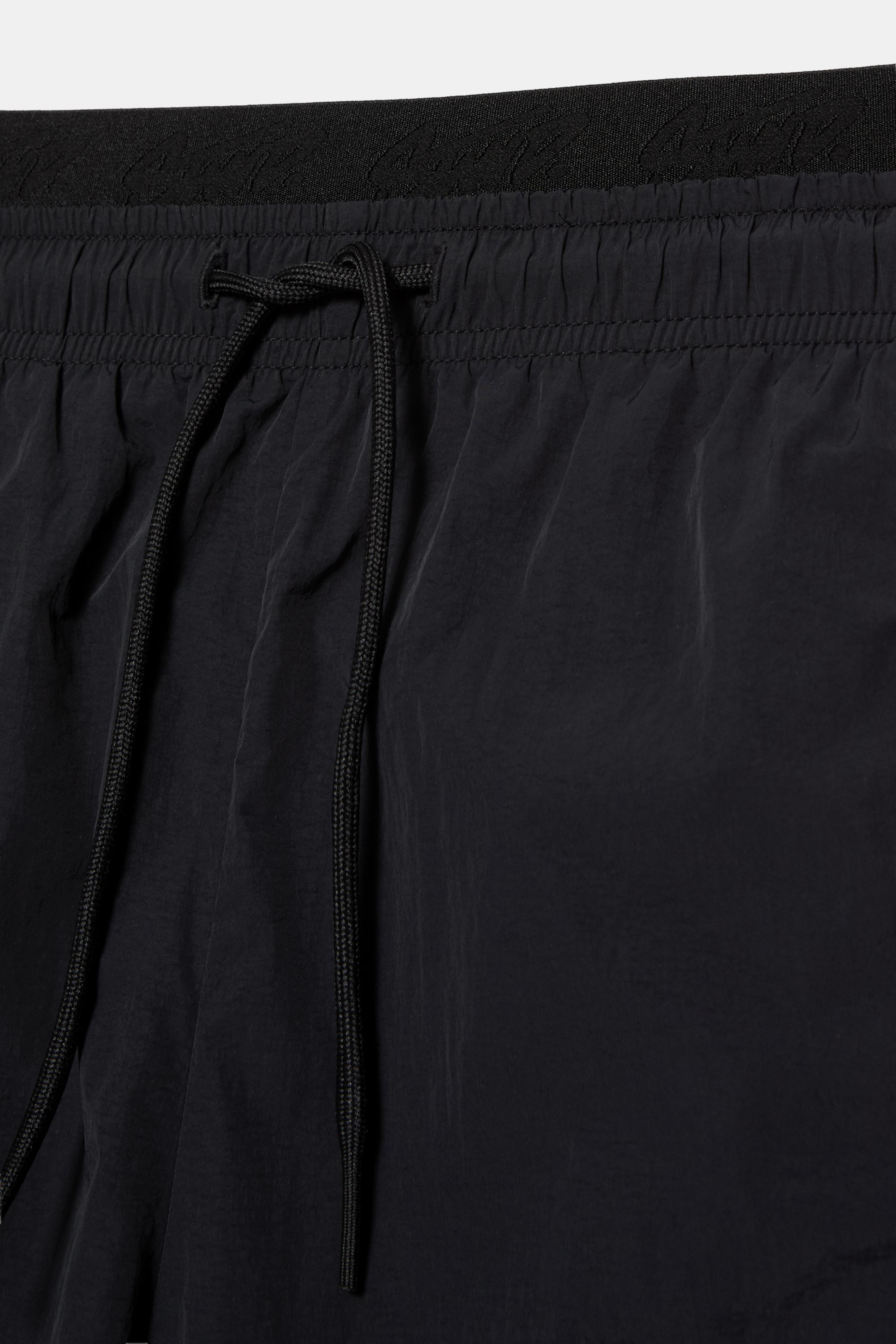 Panelled swimming trunks — Burgundy