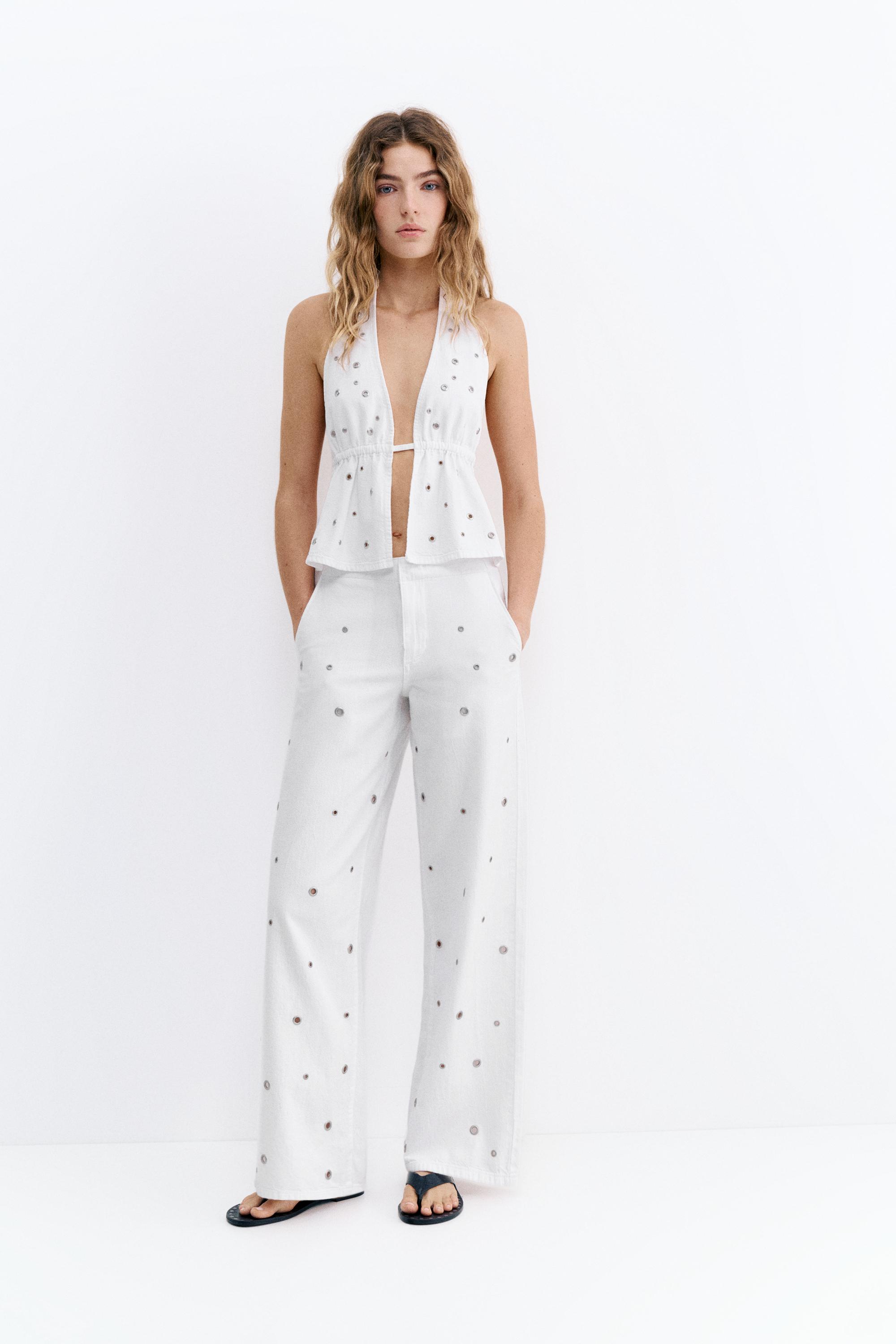 Straight-leg jeans with eyelets — White