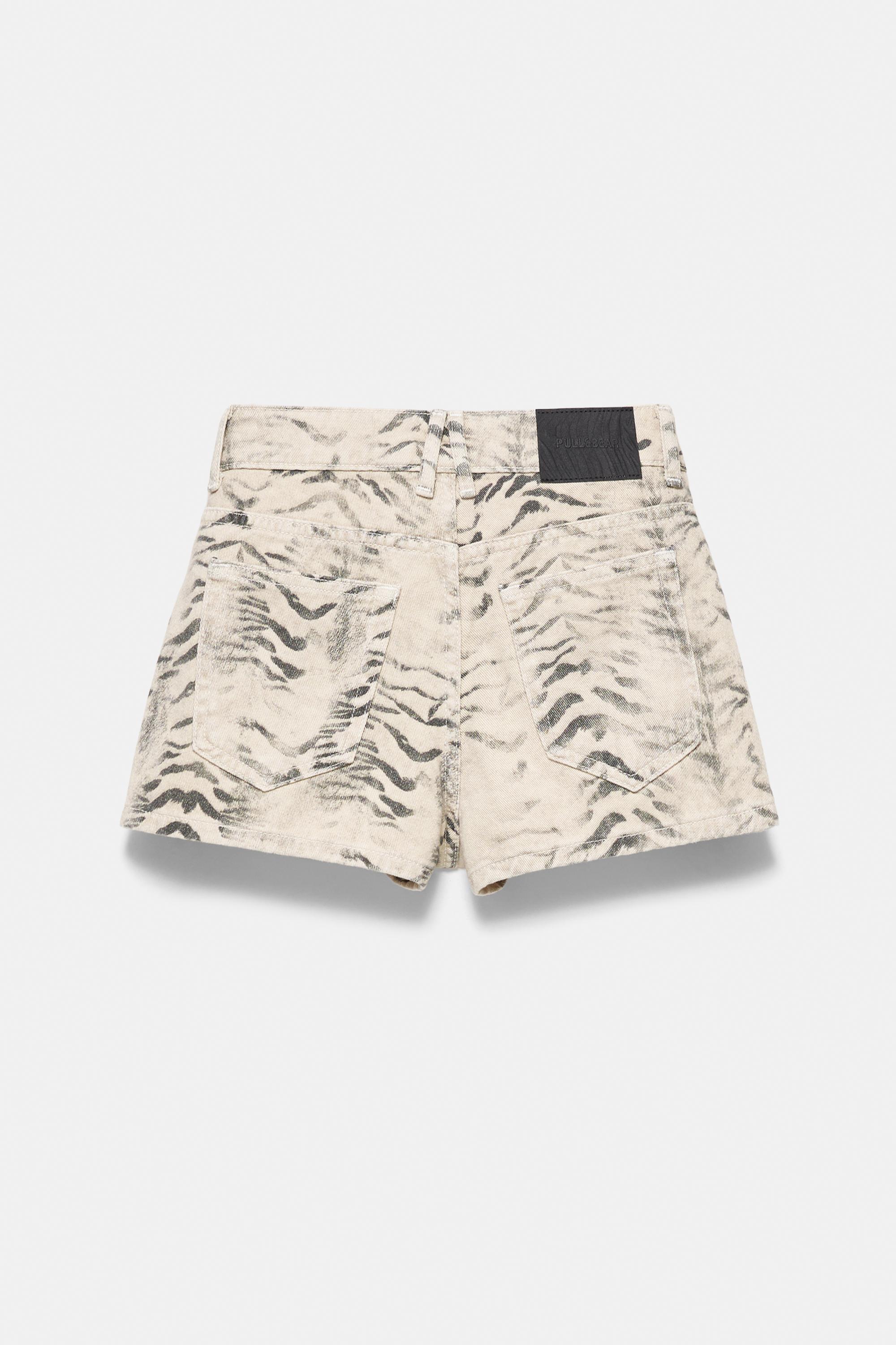 Leopard print denim mini shorts
