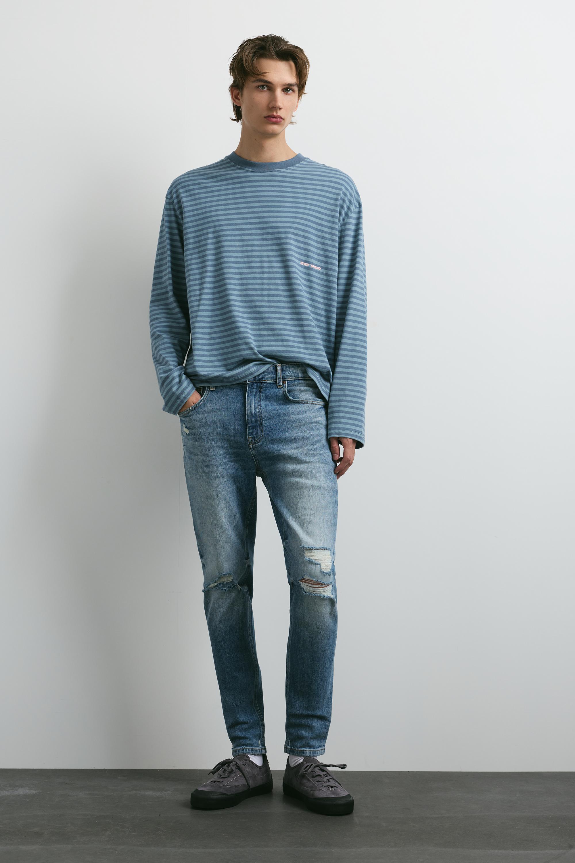 Ripped skinny jeans — Medium blue