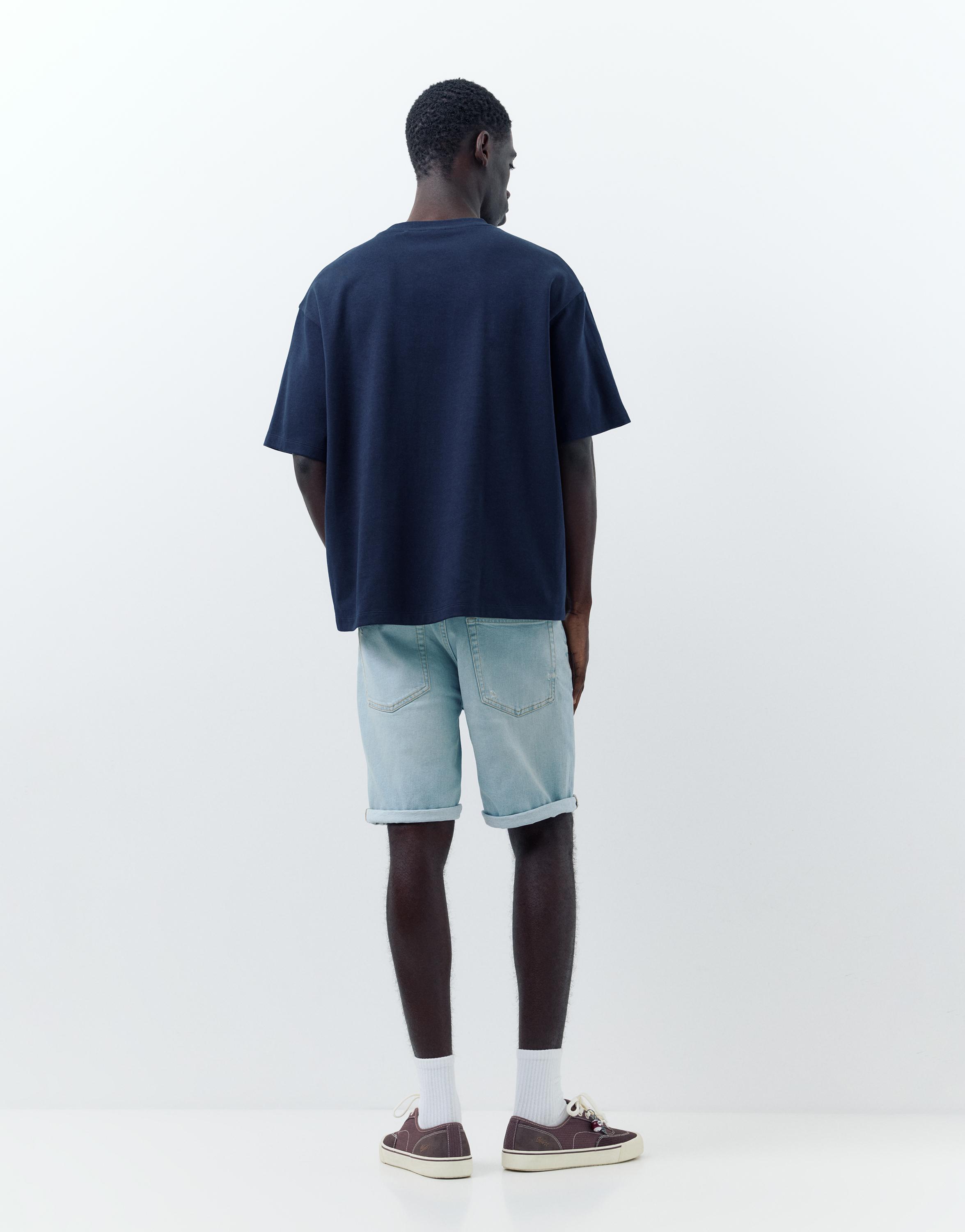 Ripped denim Bermuda shorts — Pale indigo