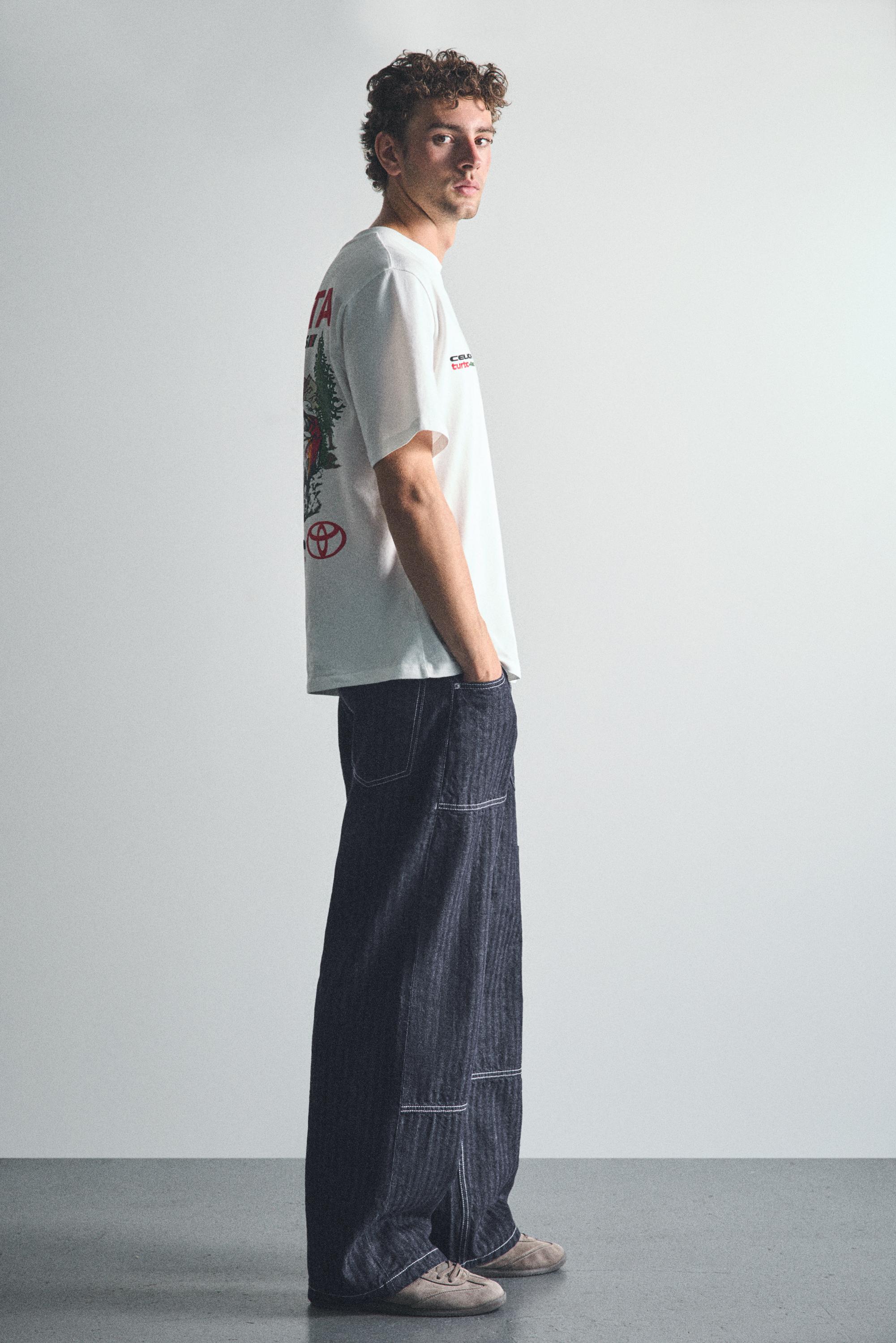 Striped relaxed-fit cargo jeans — Navy