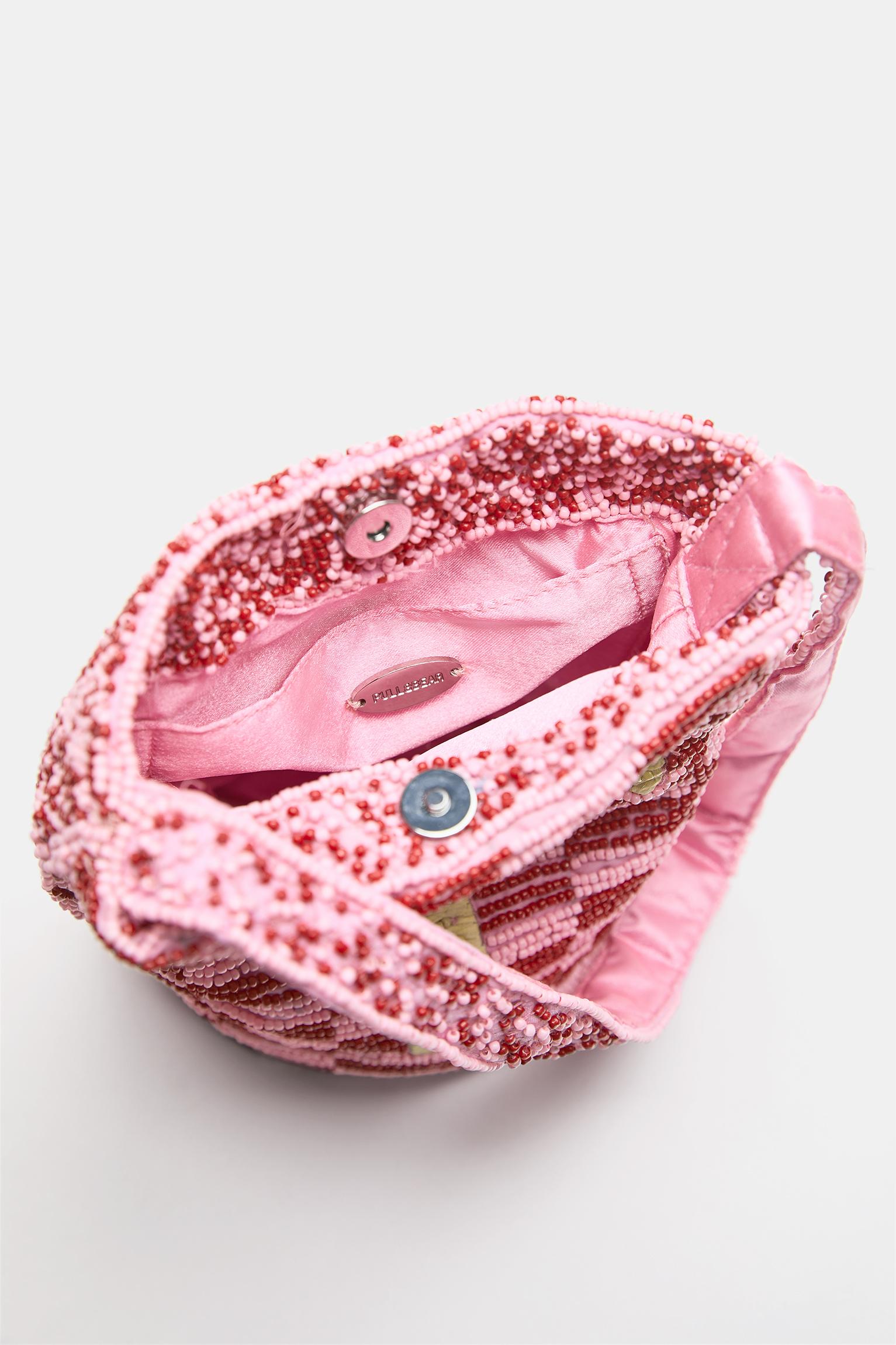 Boncuk detaylı kol çantası