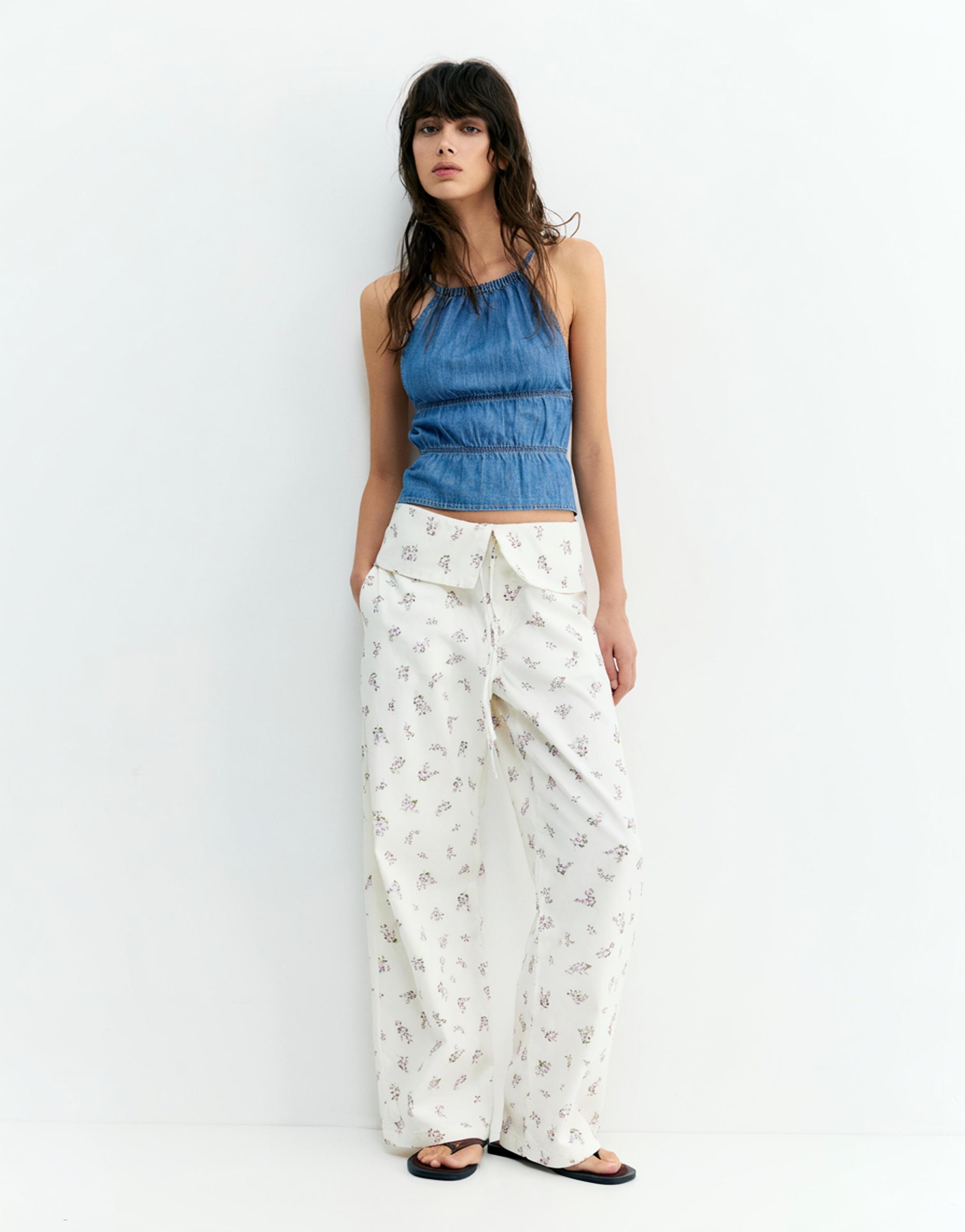 Floral trousers with turn-up waist — White