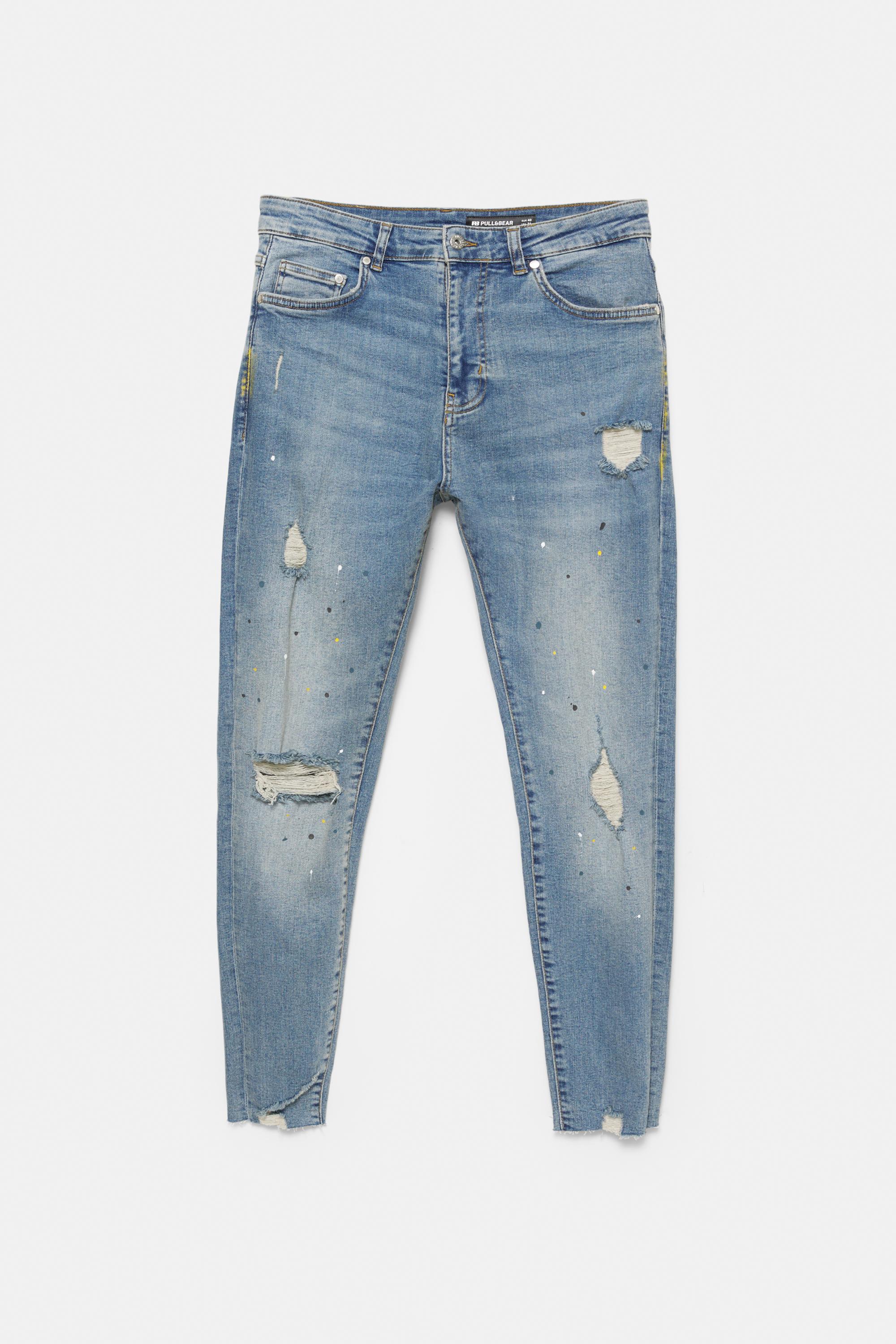 Paint splatter carrot-fit jeans — Medium blue