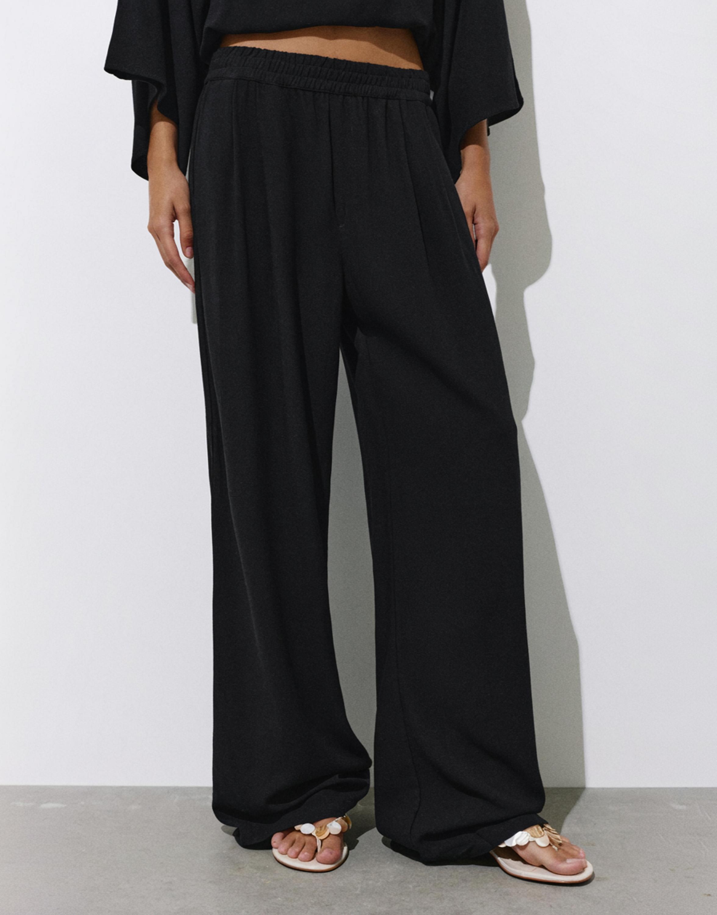 Flowing darted trousers — Black