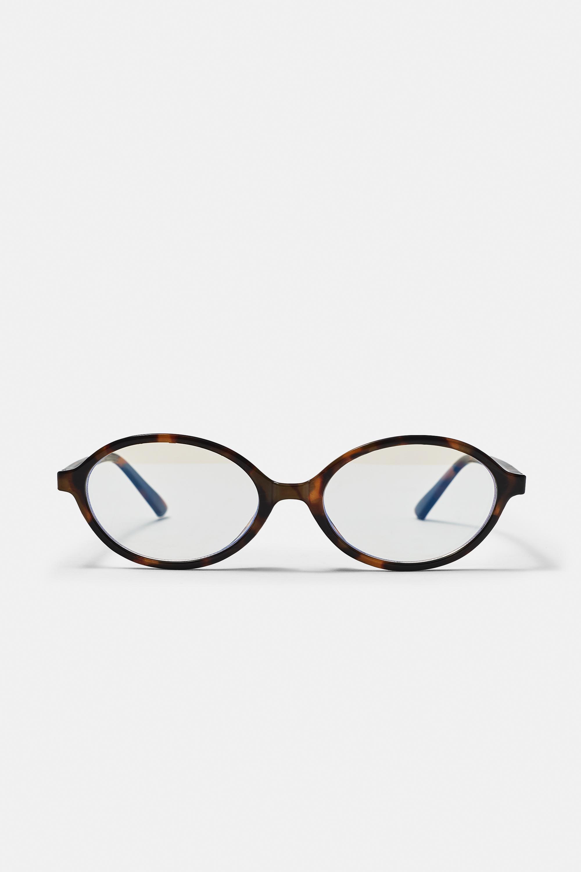 Oval tortoiseshell-effect sunglasses — Brown