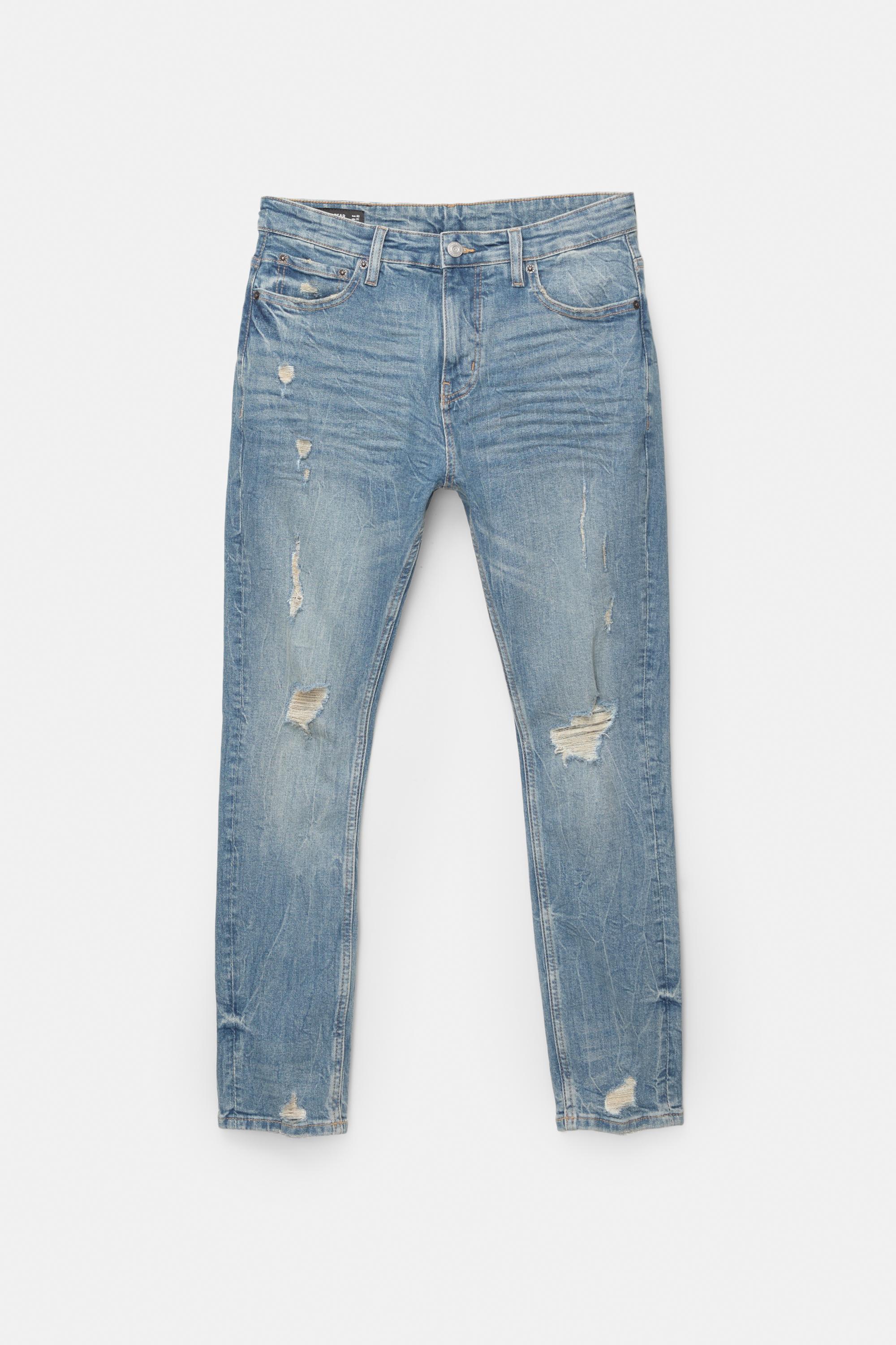Ripped skinny jeans — Medium blue