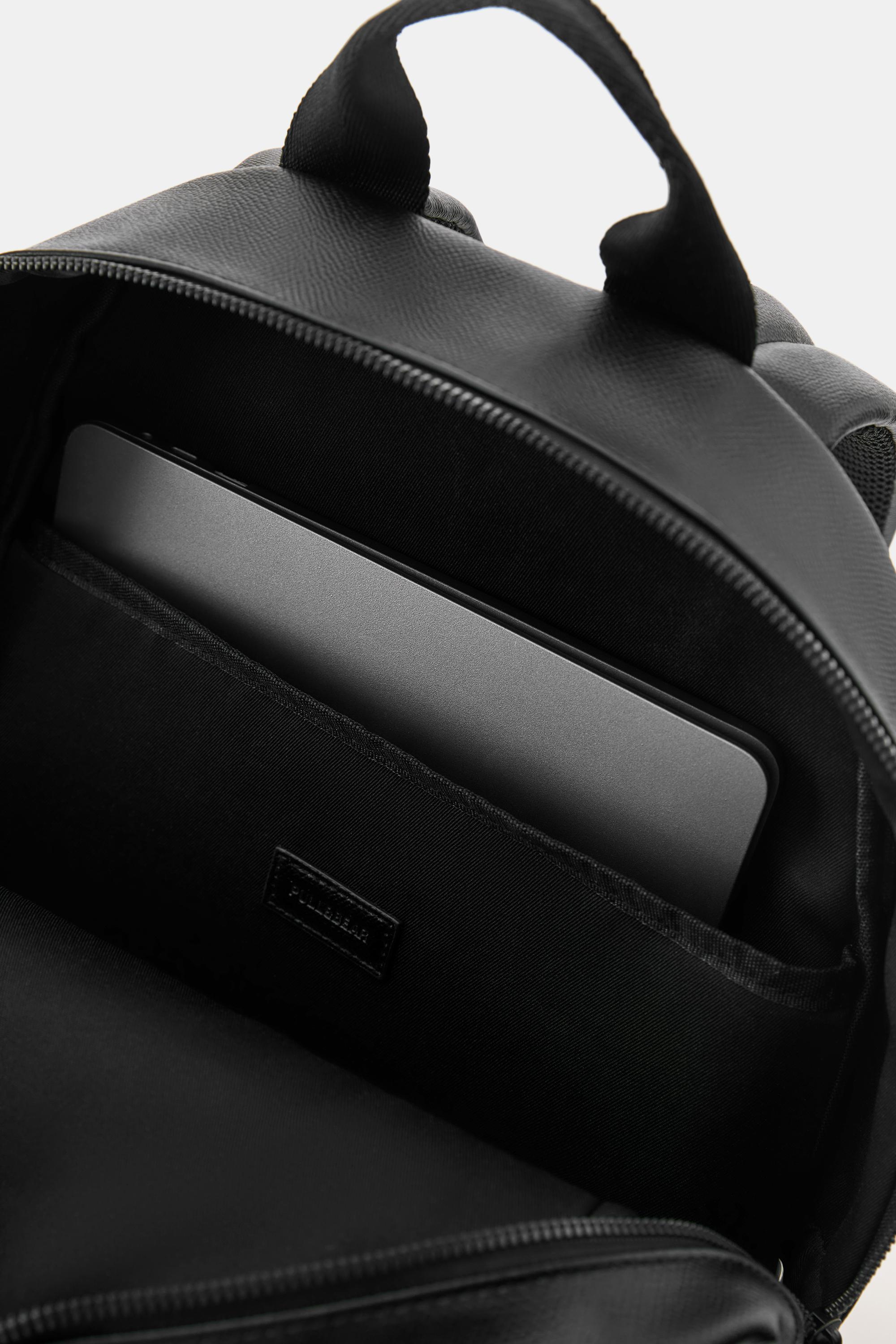 Textured pocket backpack — Black