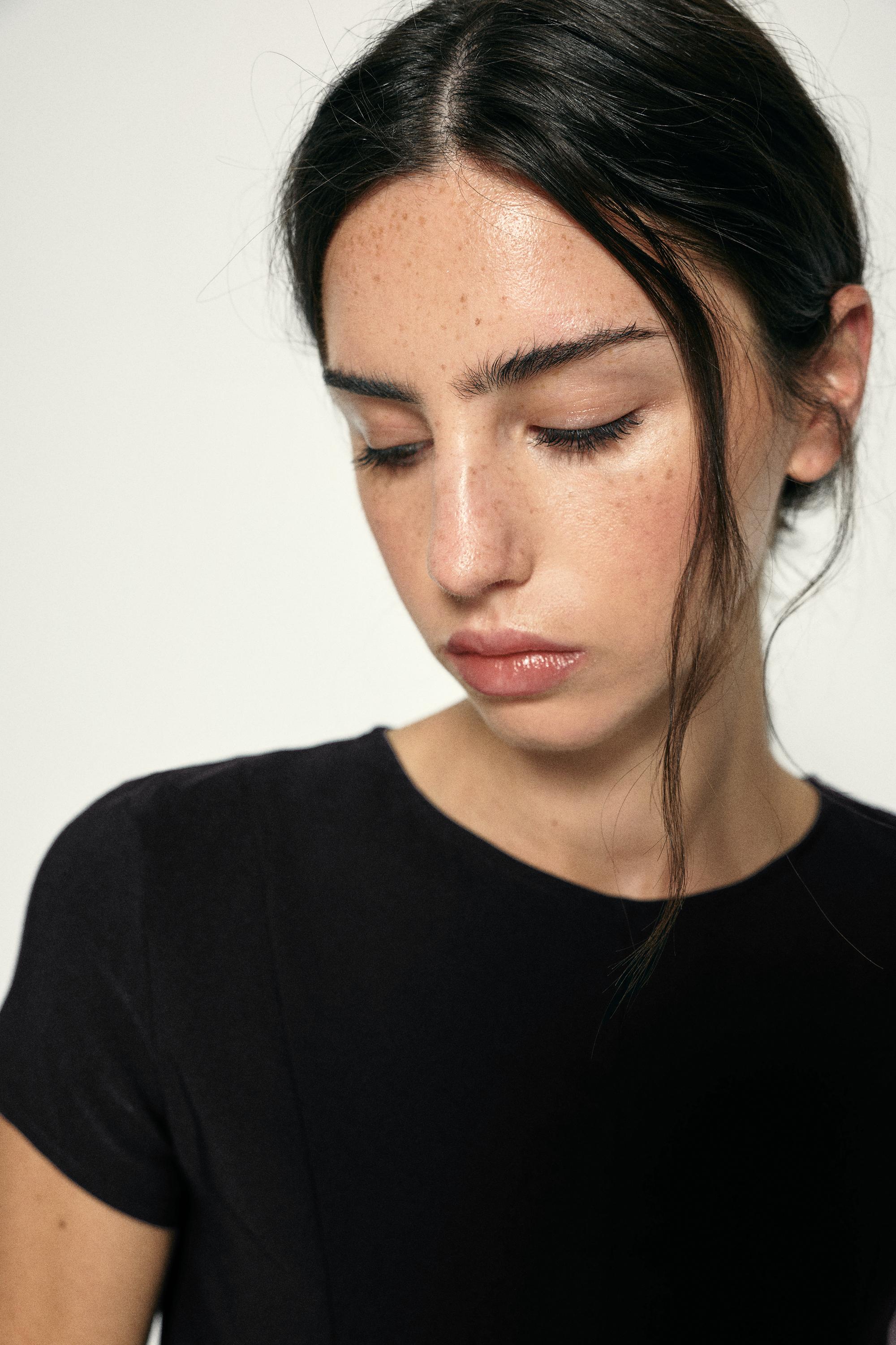 Peplum top — Black