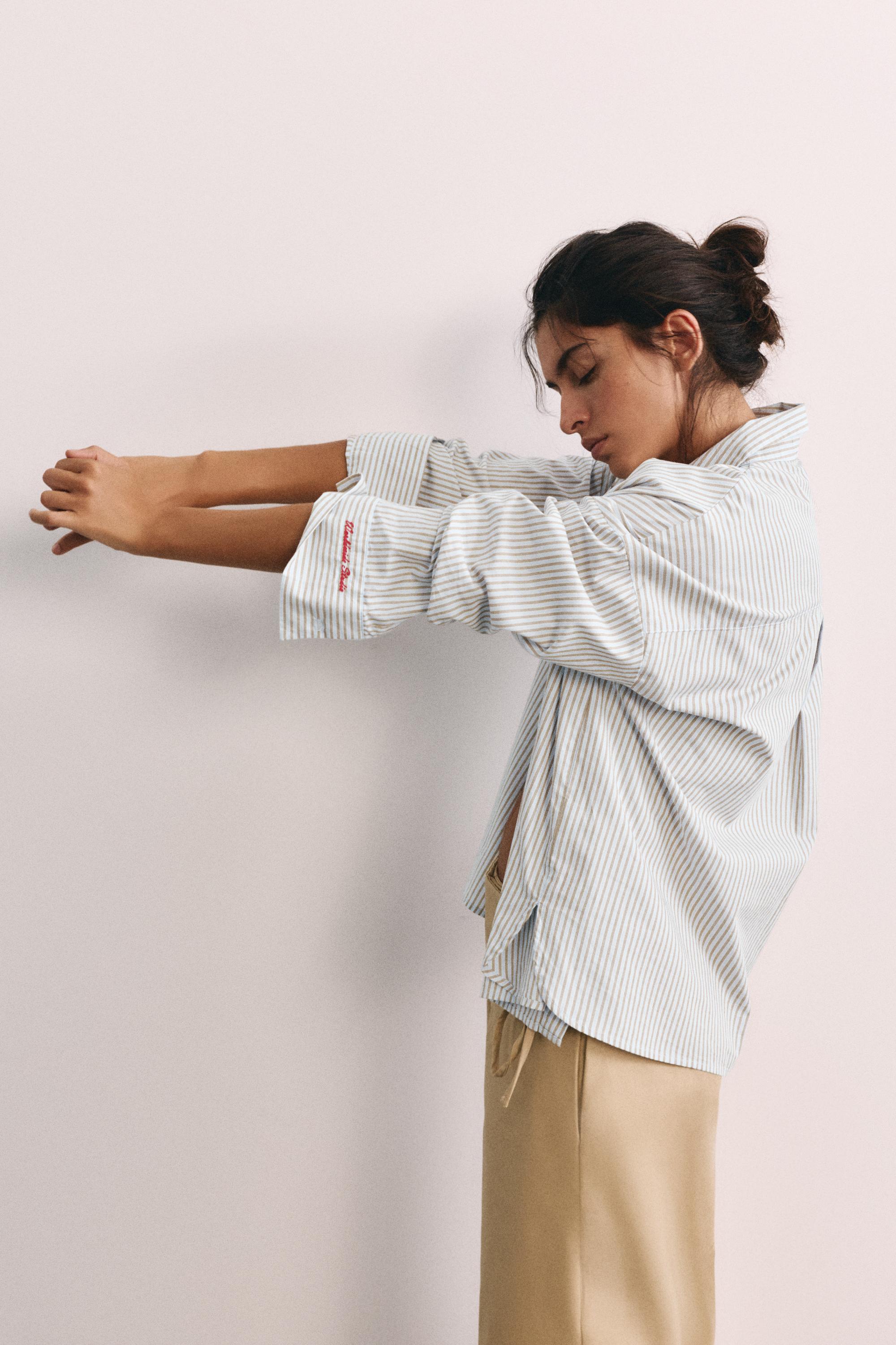 Embroidered striped shirt — Pastel blue
