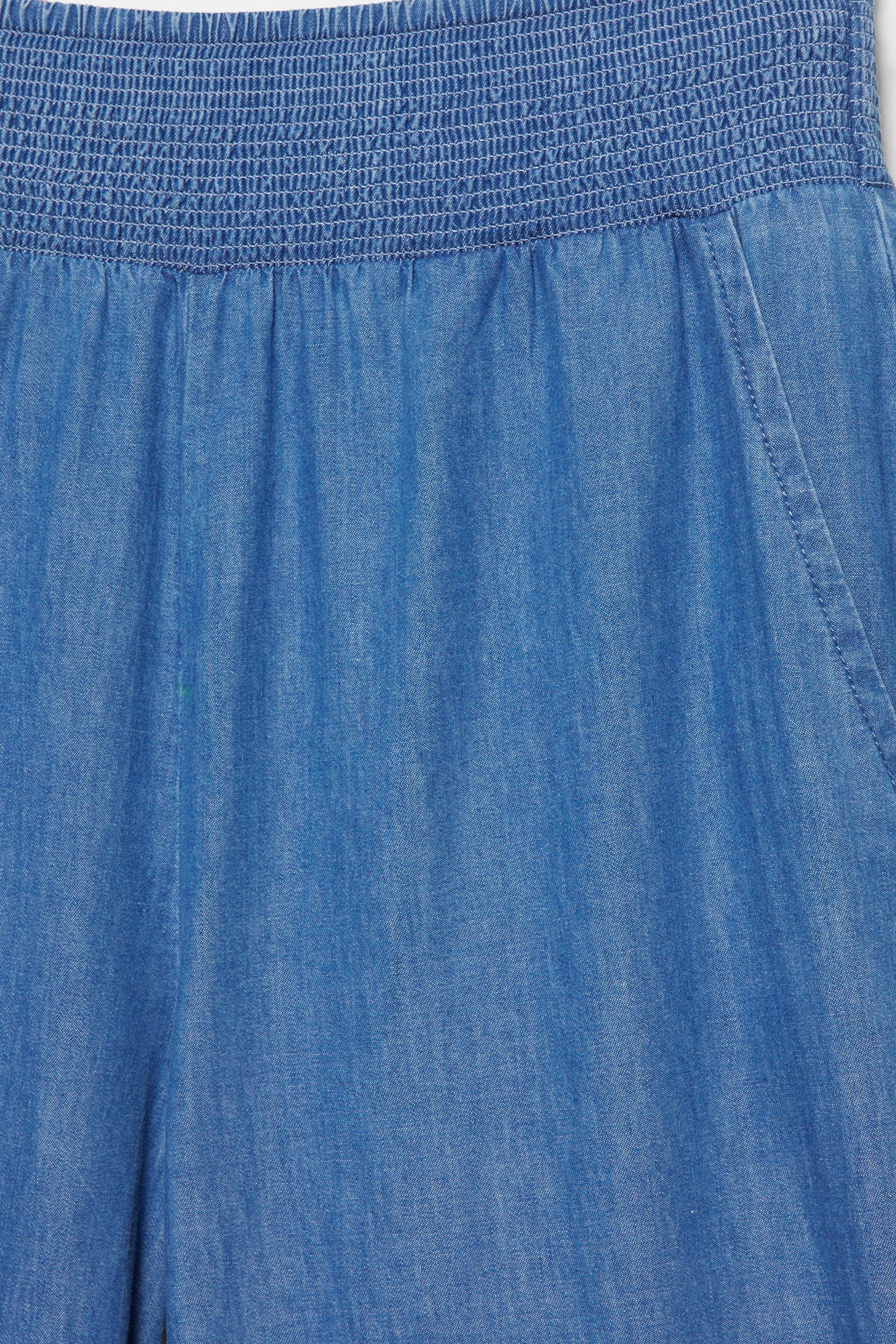 Flowing denim trousers with elasticated waist — Medium blue