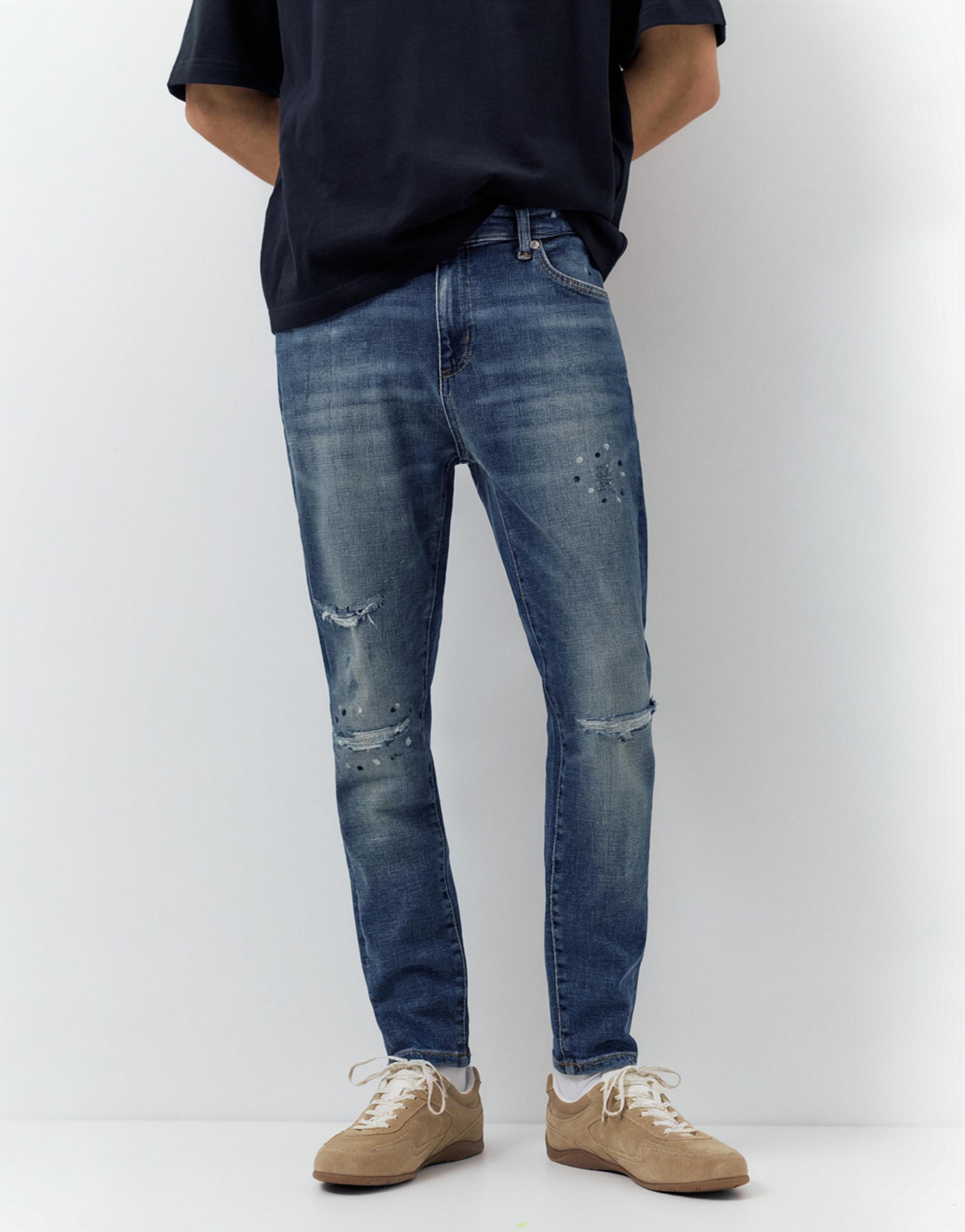 Ripped skinny jeans — Medium blue