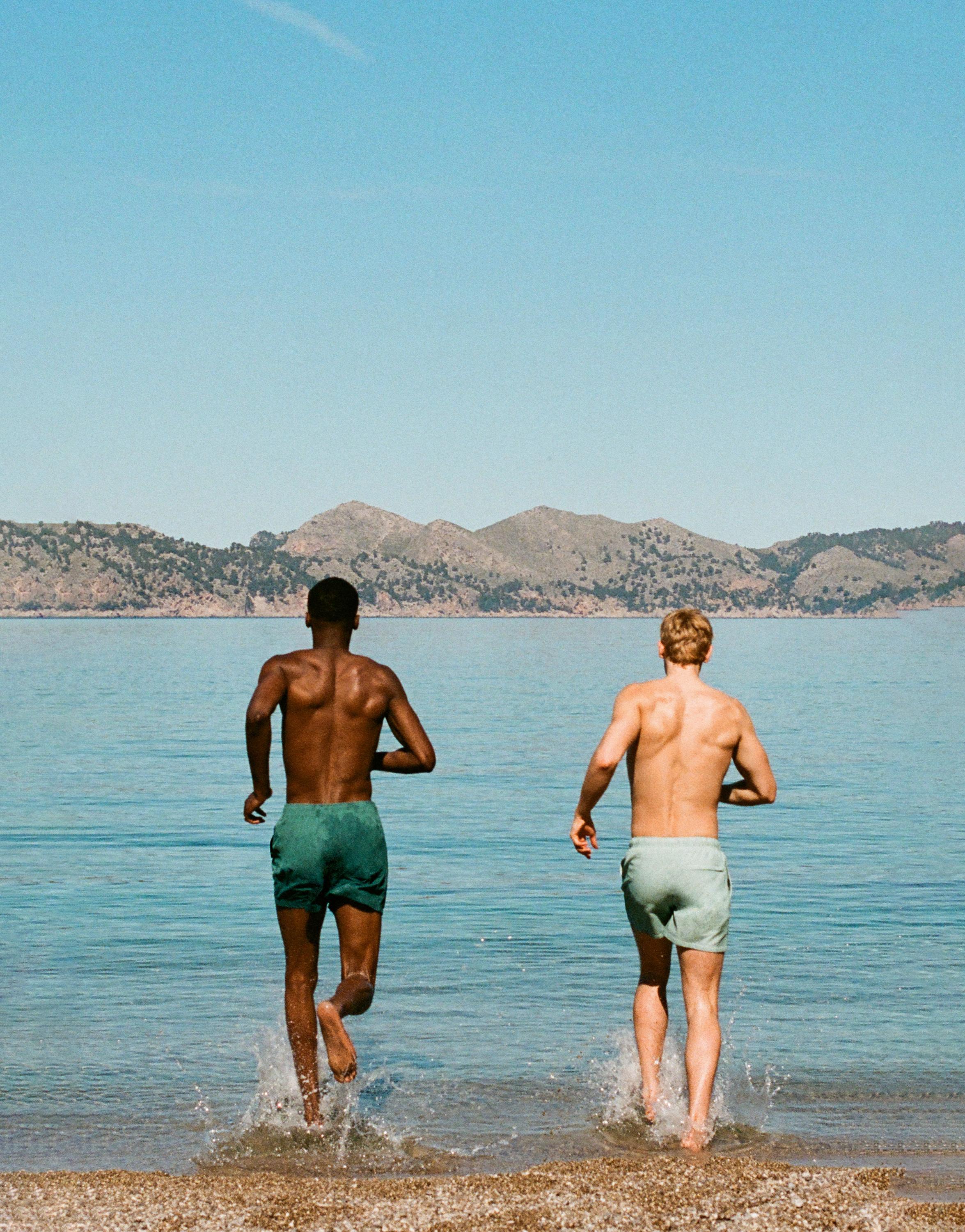 Striped seersucker swimming trunks — Green