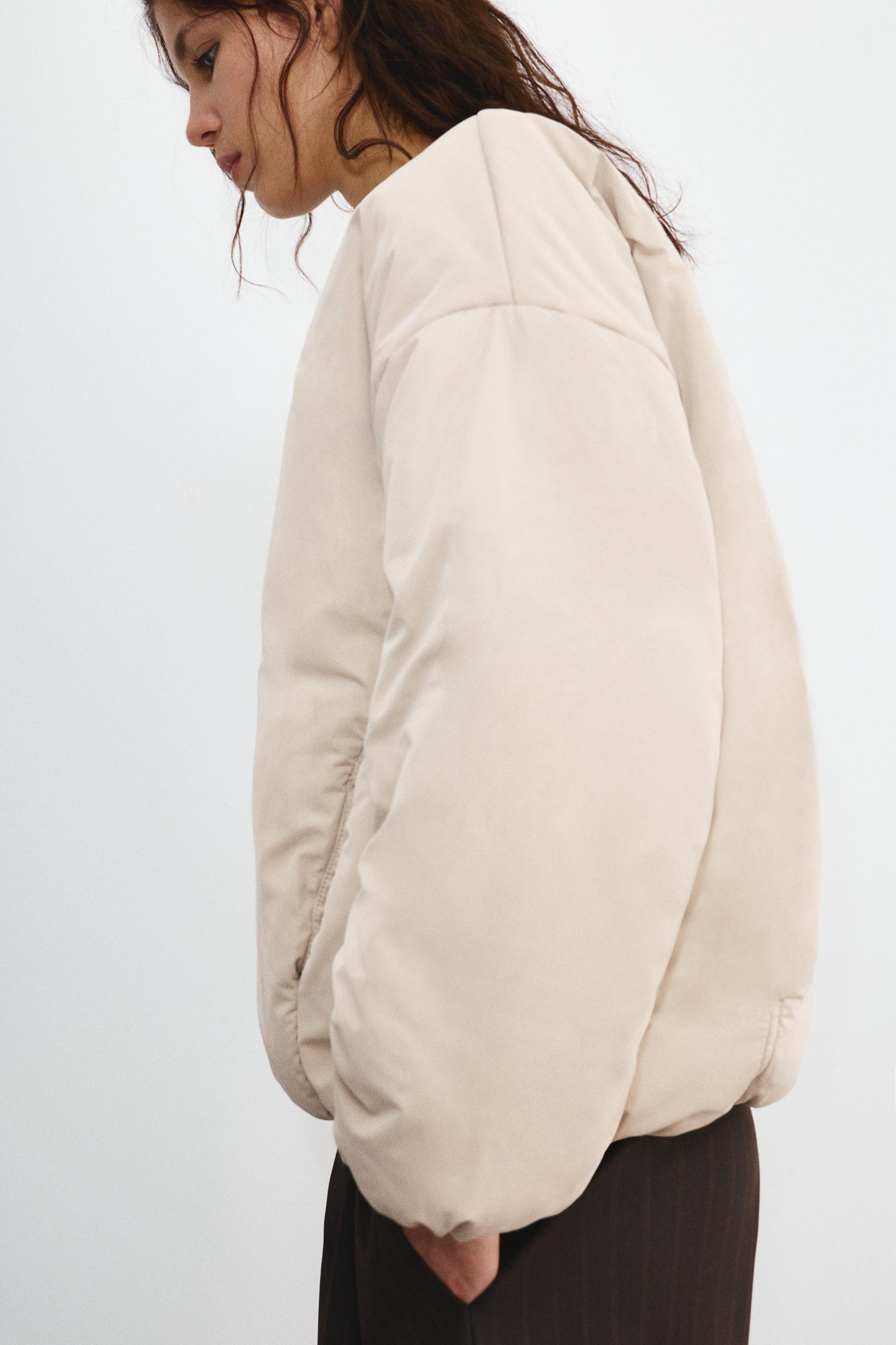 Puffer jacket with snap button