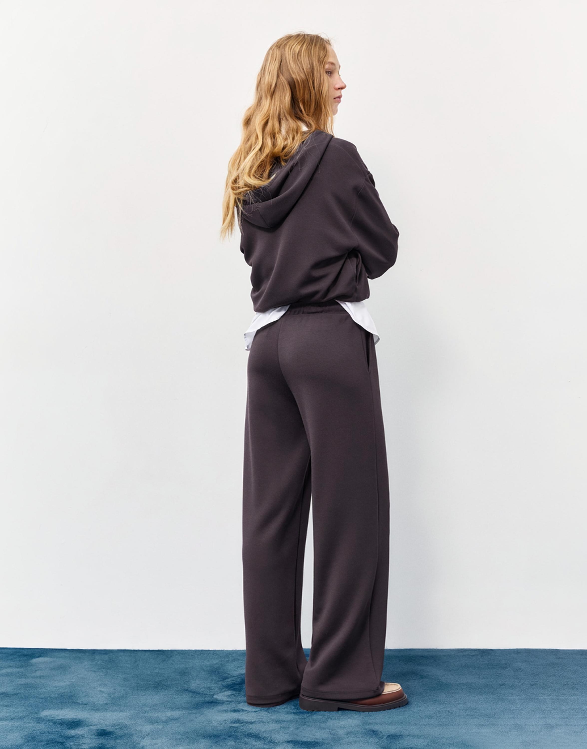 Soft-touch wide-leg trousers — Black