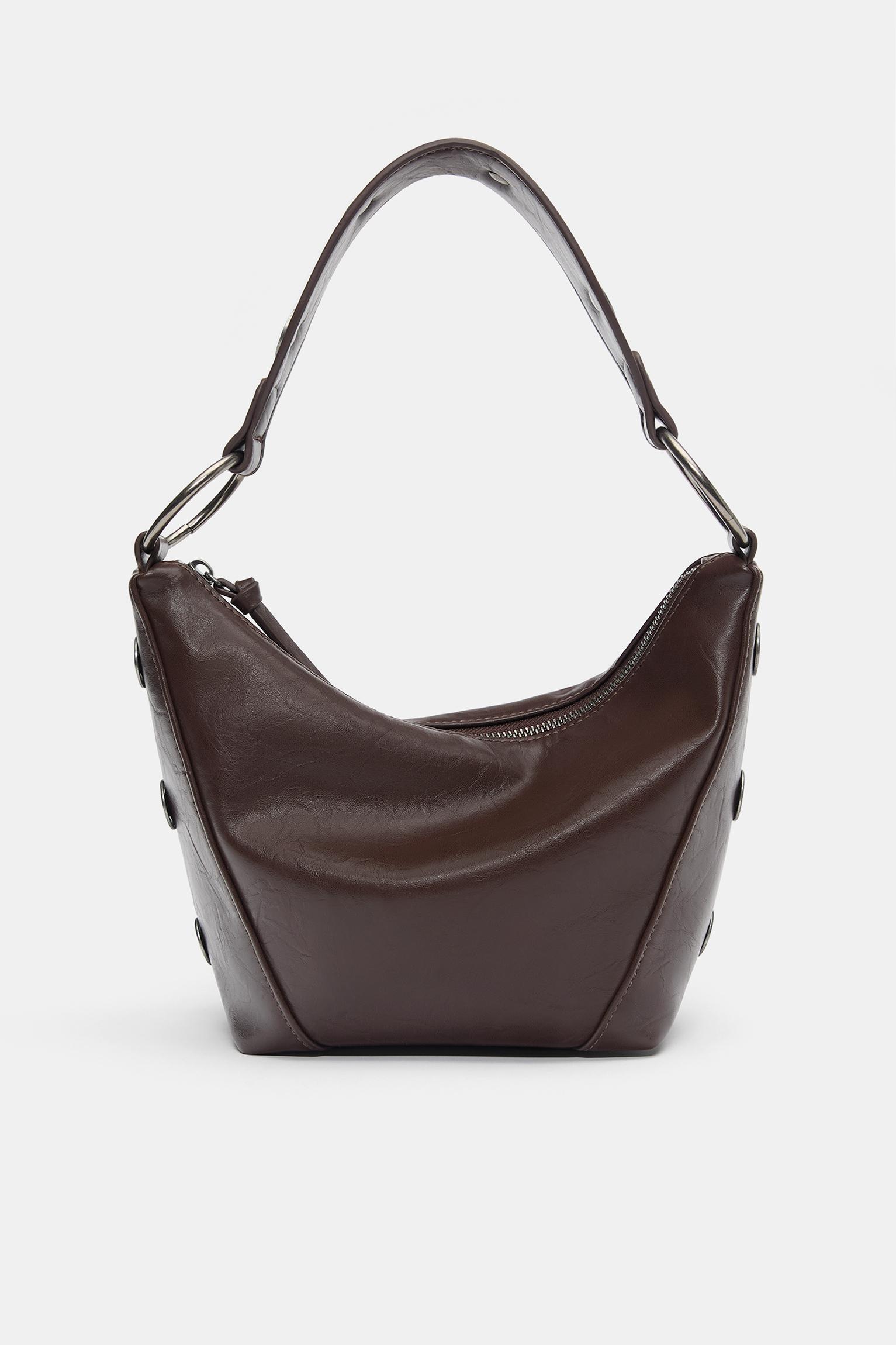 Schultertasche Mit Nieten Und Ringen