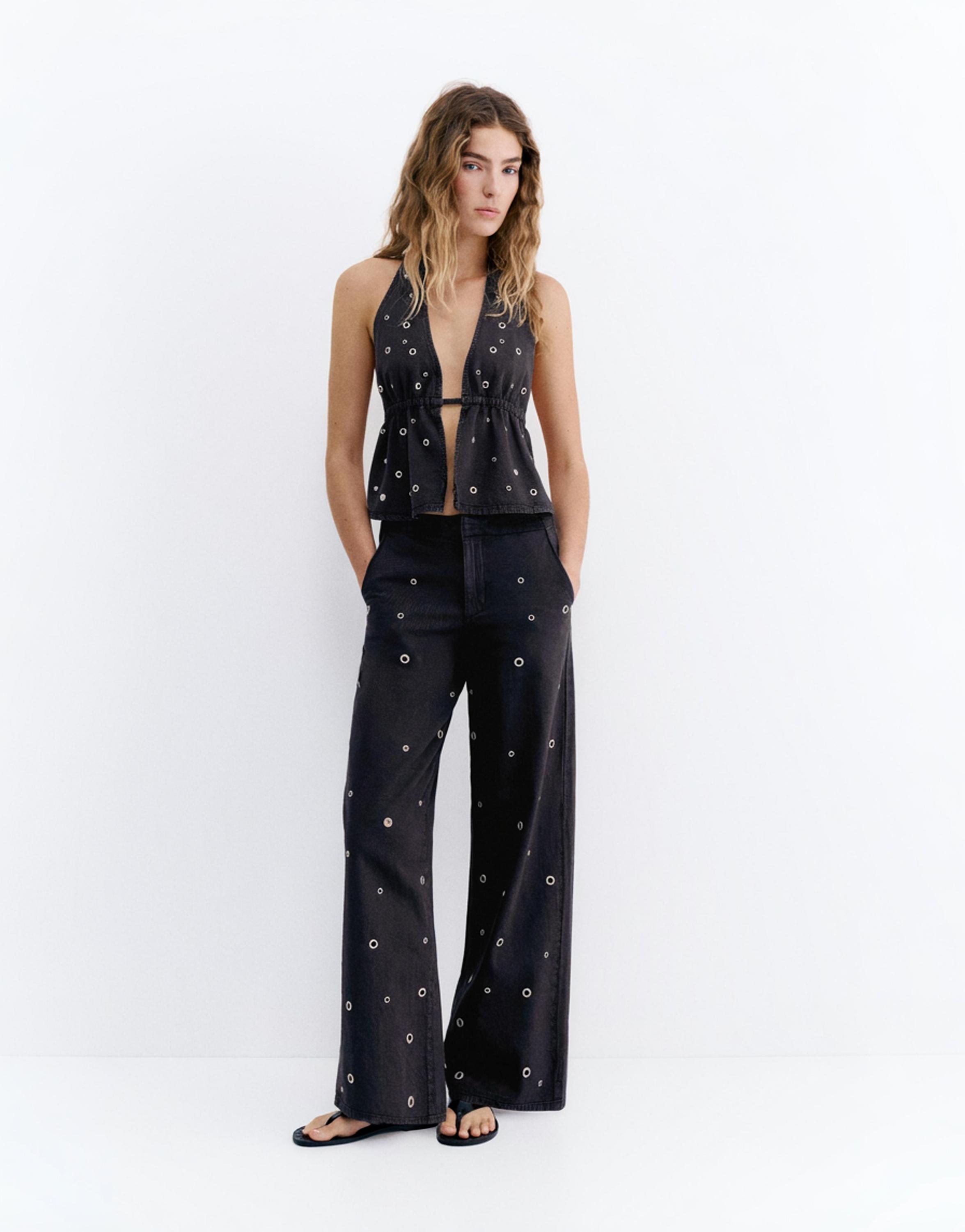 Straight-leg jeans with eyelets — Black