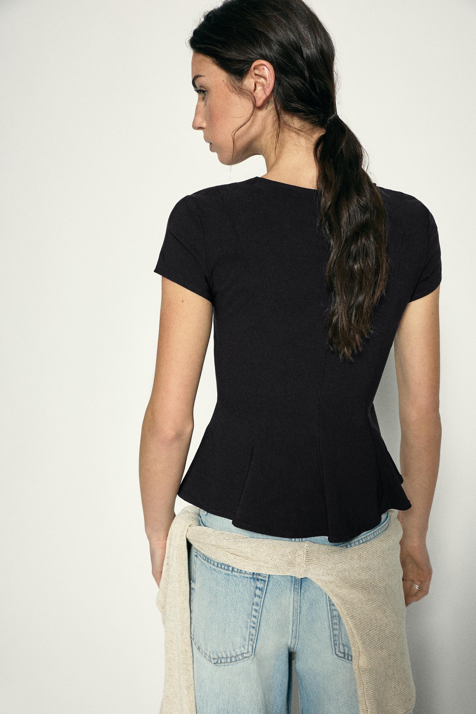 Peplum top — Black