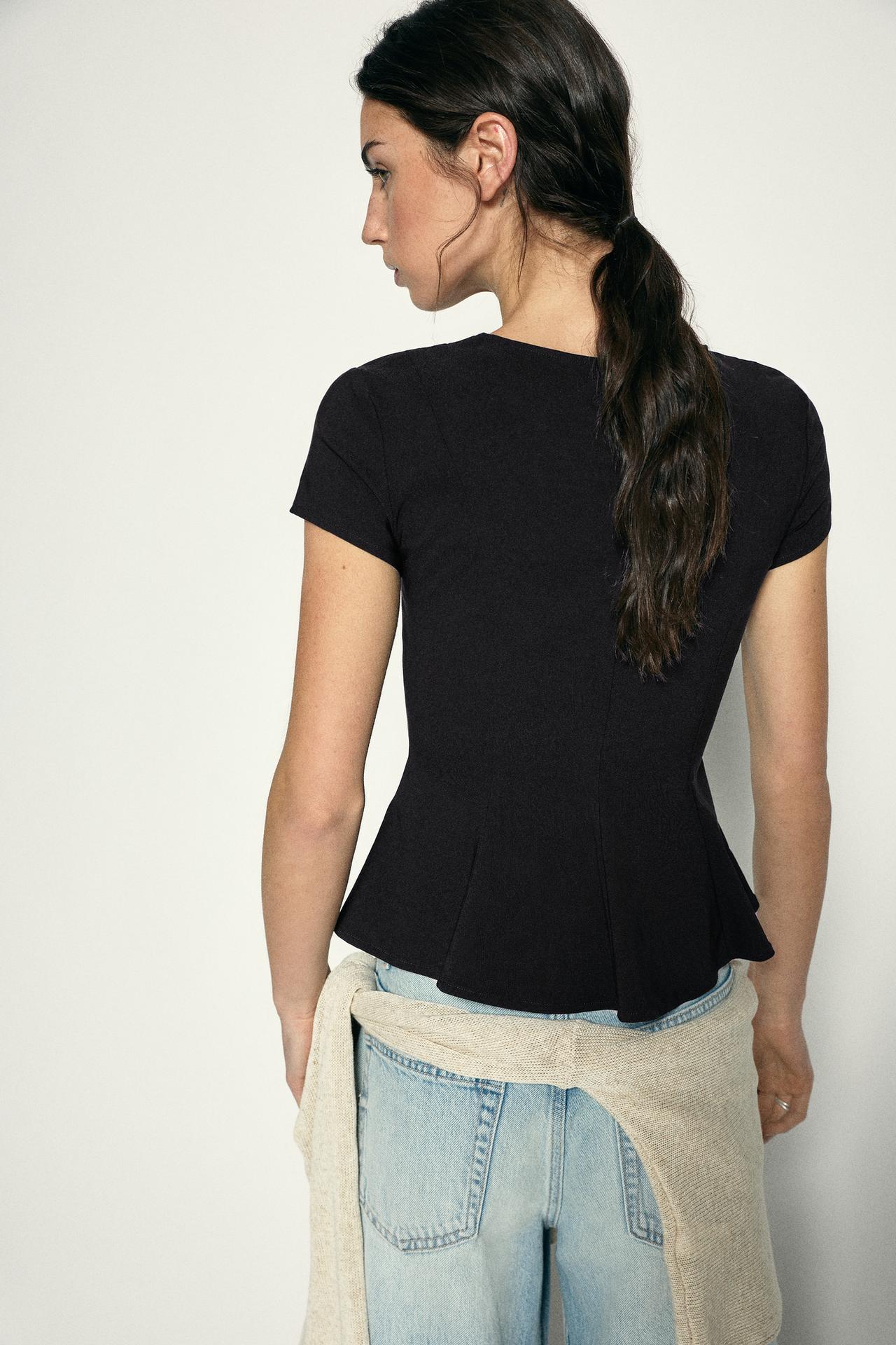 Peplum top — Black