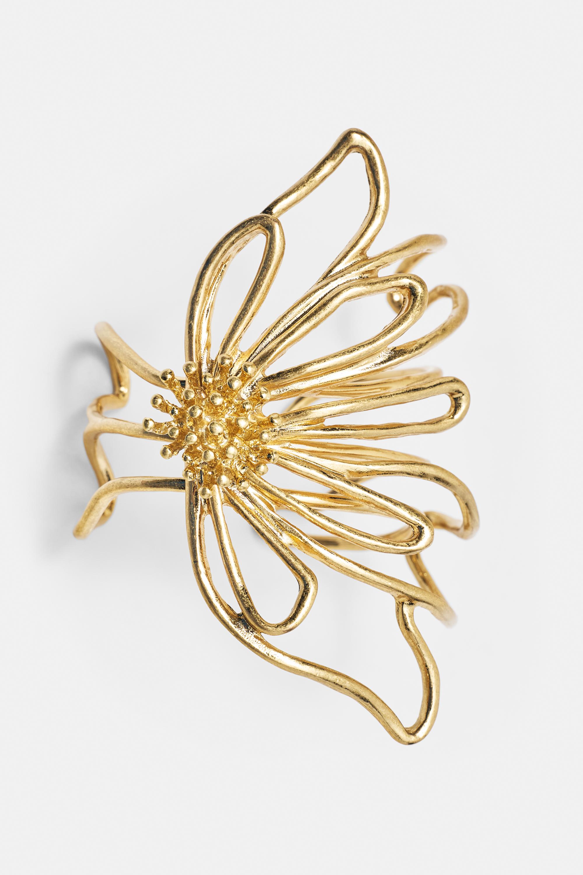 Floral rigid bracelet — Gold