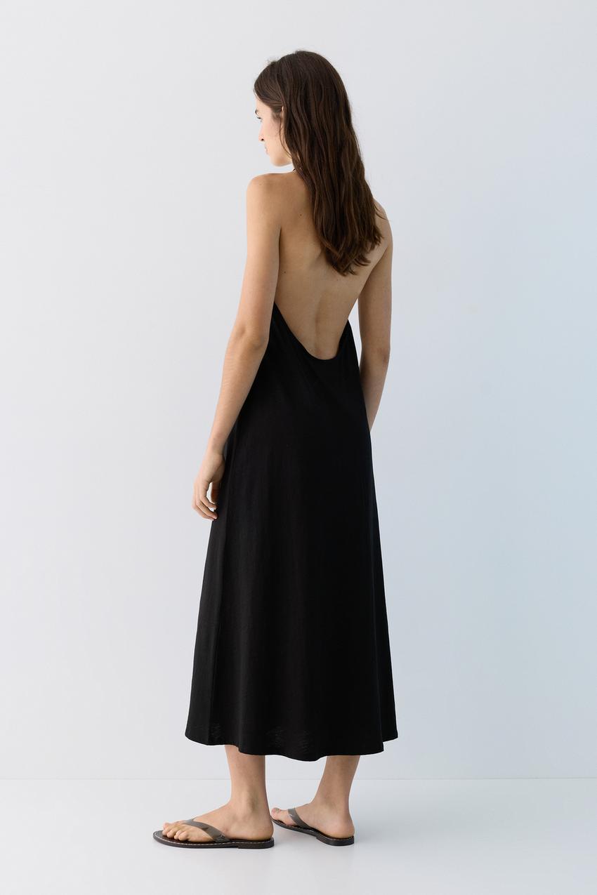 Black midi dress and halter neck co-ord with open back.