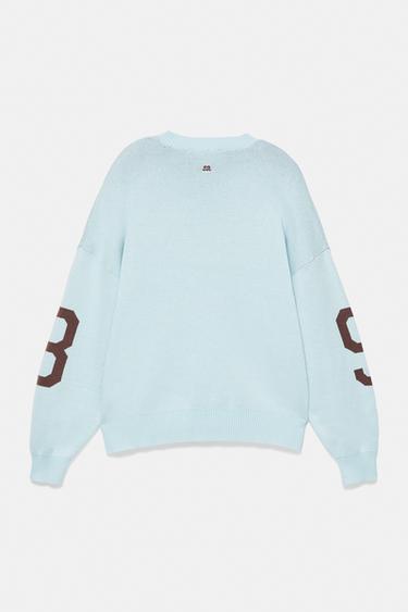 Light blue number 8 jumper — Pastel blue 7