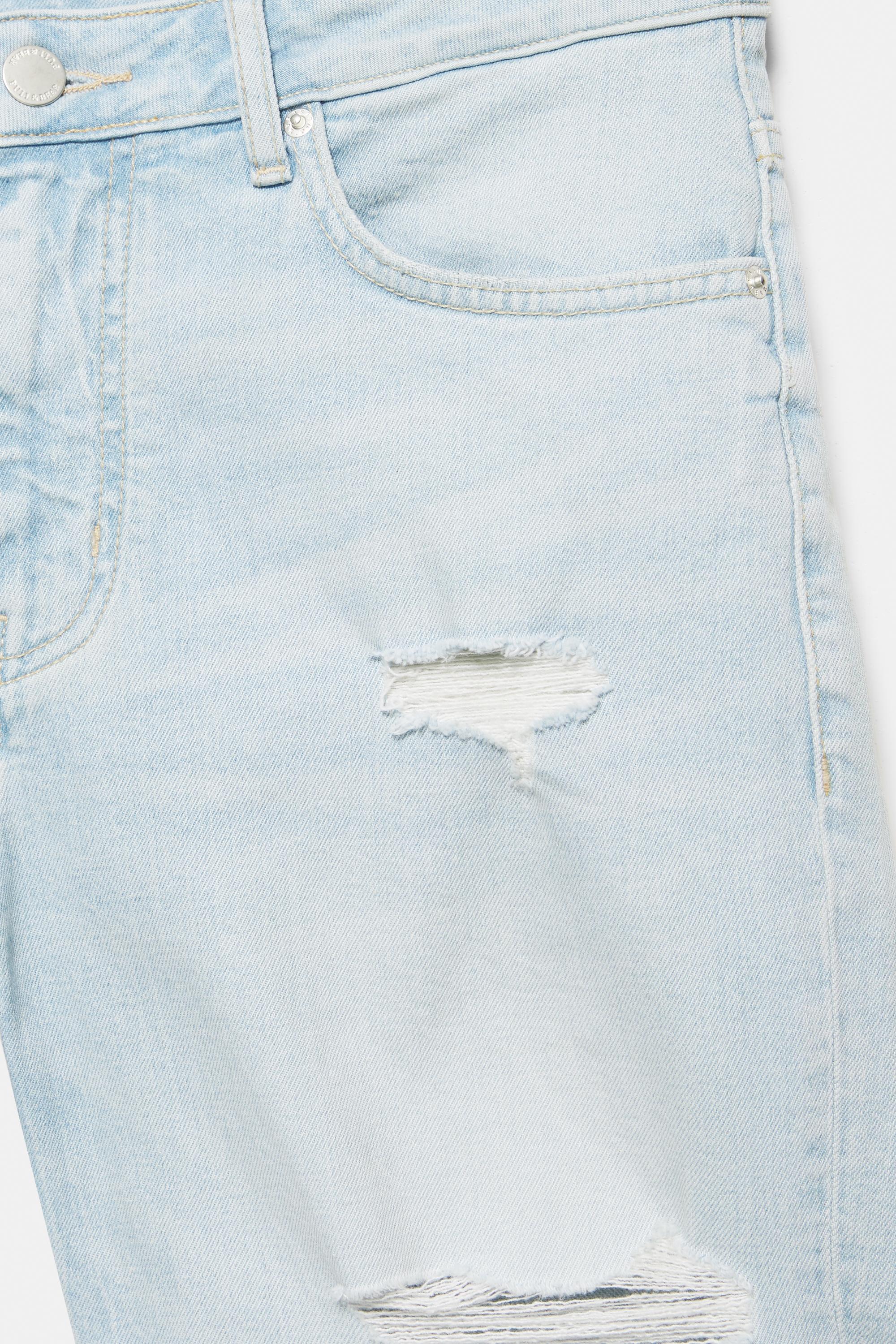 Ripped denim Bermuda shorts — Pale indigo