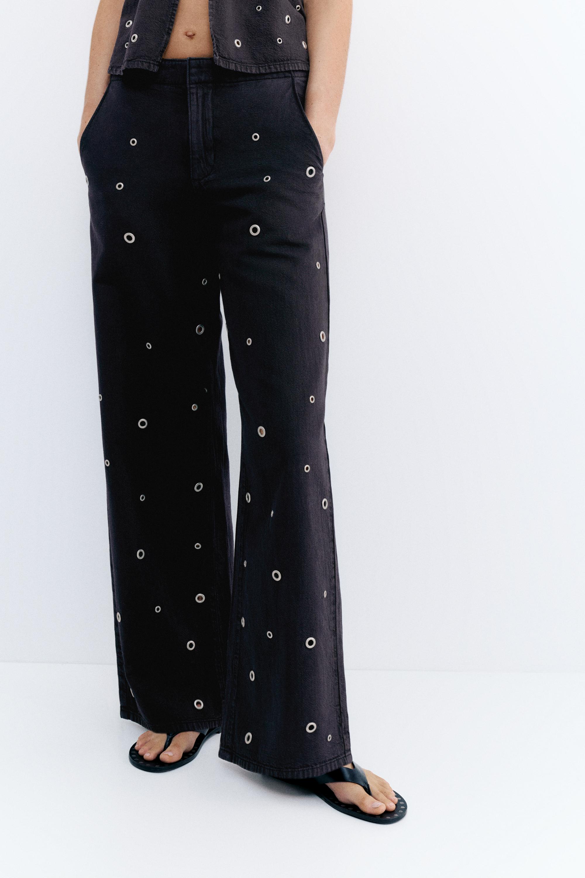 Straight-leg jeans with eyelets — Black