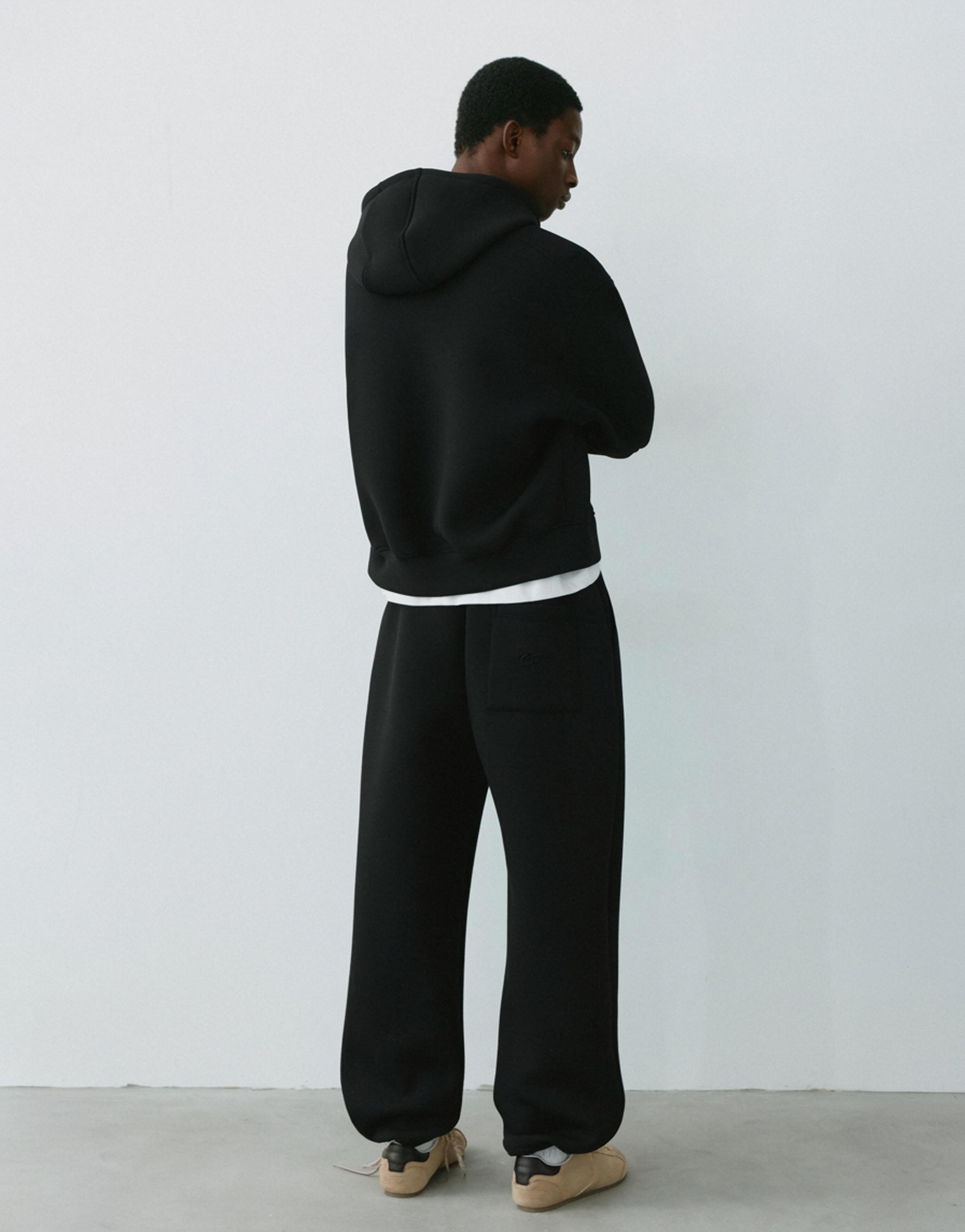 Neoprene-effect baggy trousers — Black