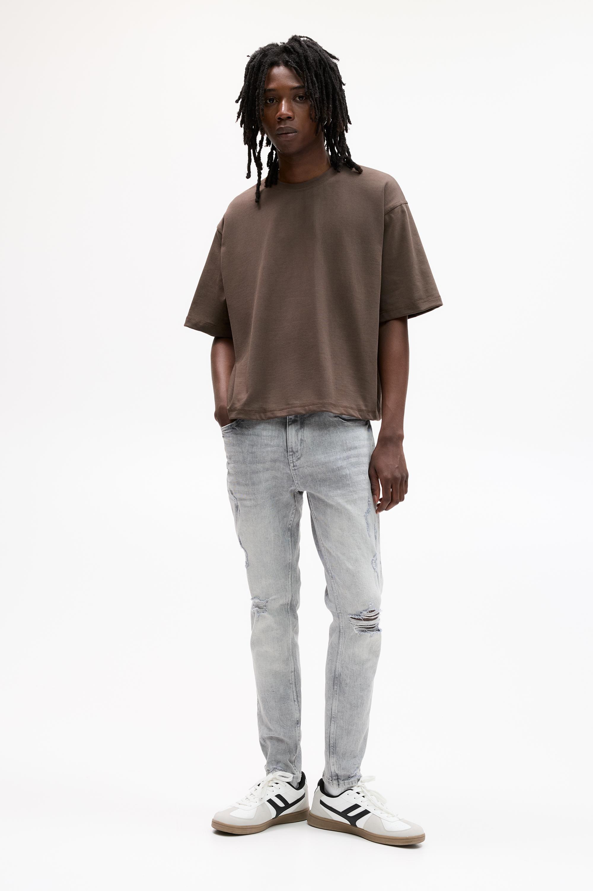 Skinny-Jeans Mit Rissen