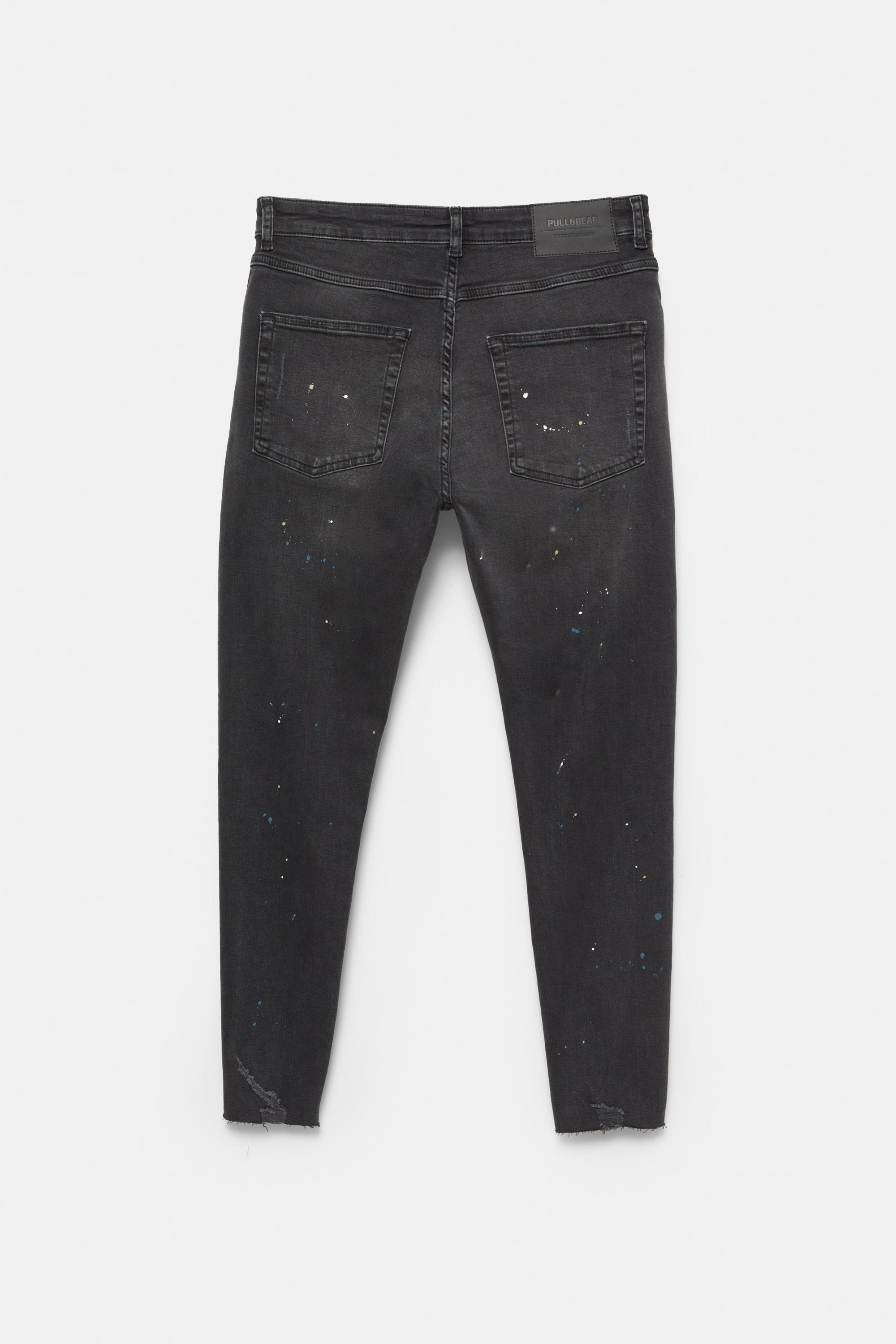 Paint splatter carrot-fit jeans — Faded black