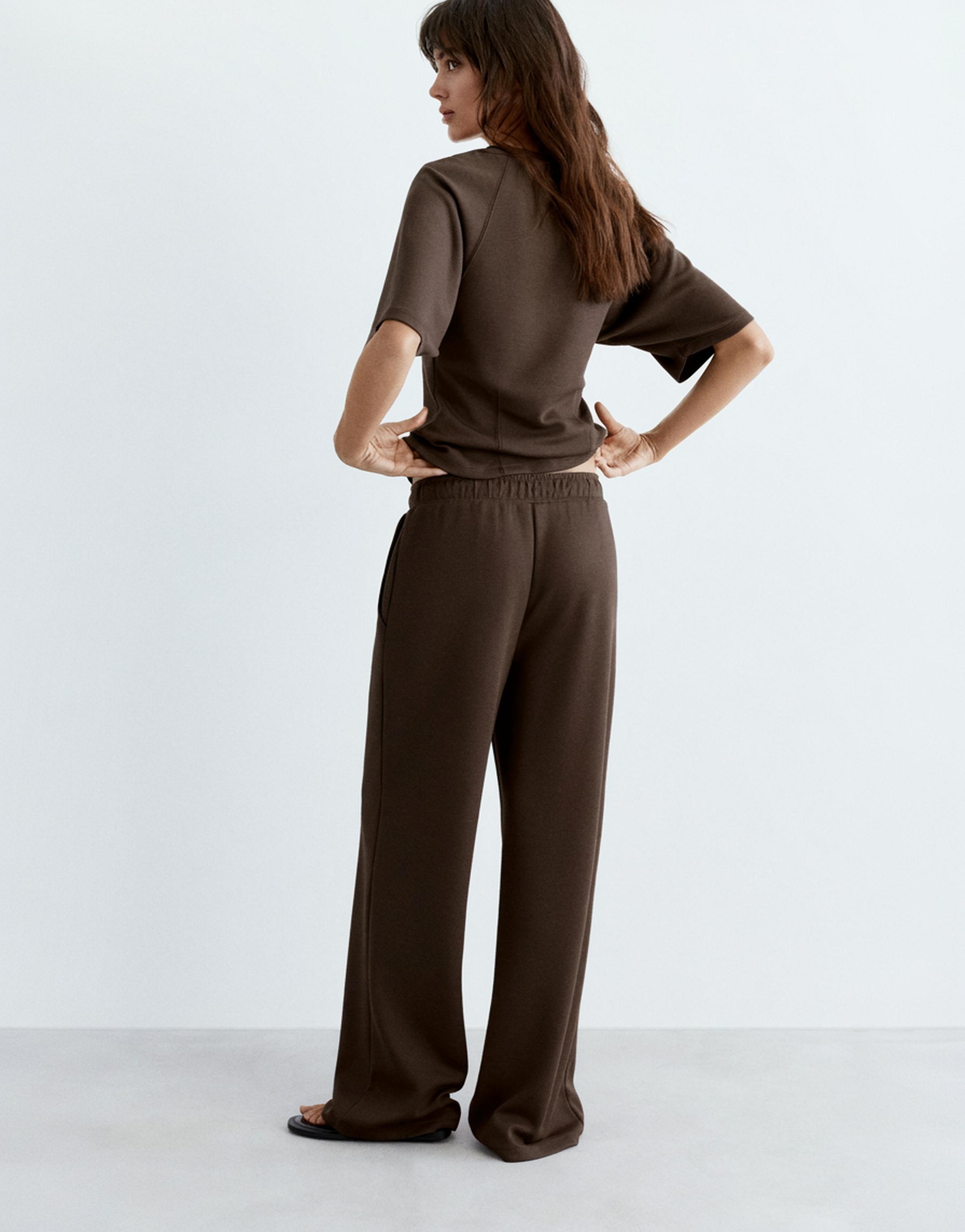 Soft-touch wide-leg trousers — Brown