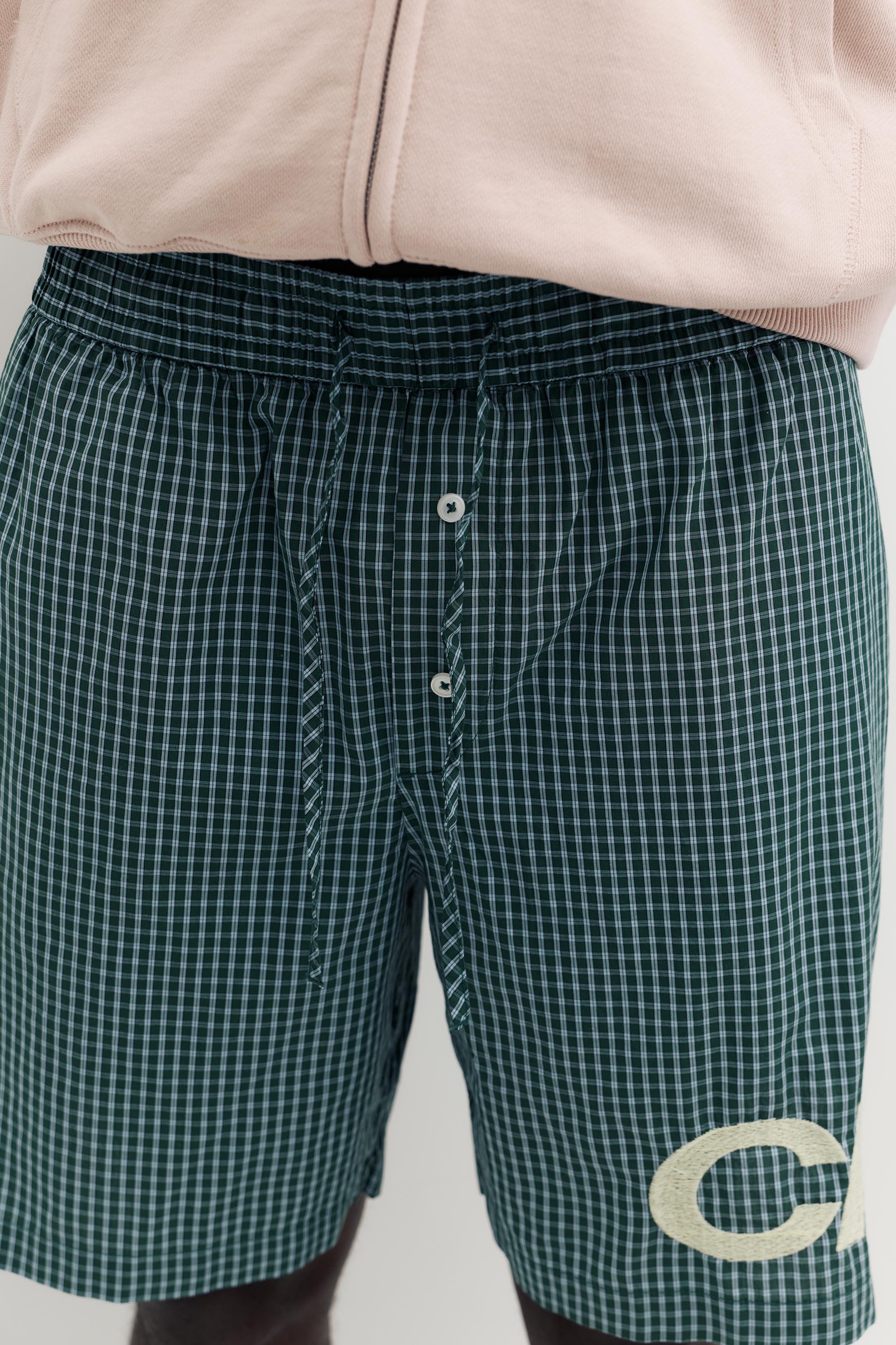 Checked graphic Bermuda shorts — Moss