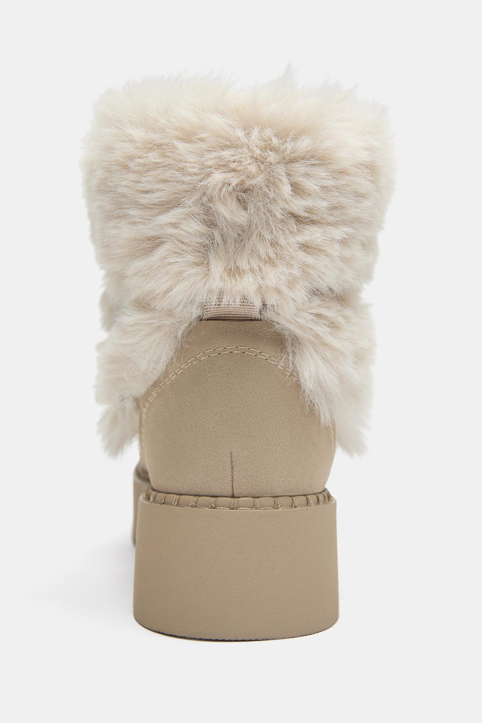 Flat faux fur boots — Ecru
