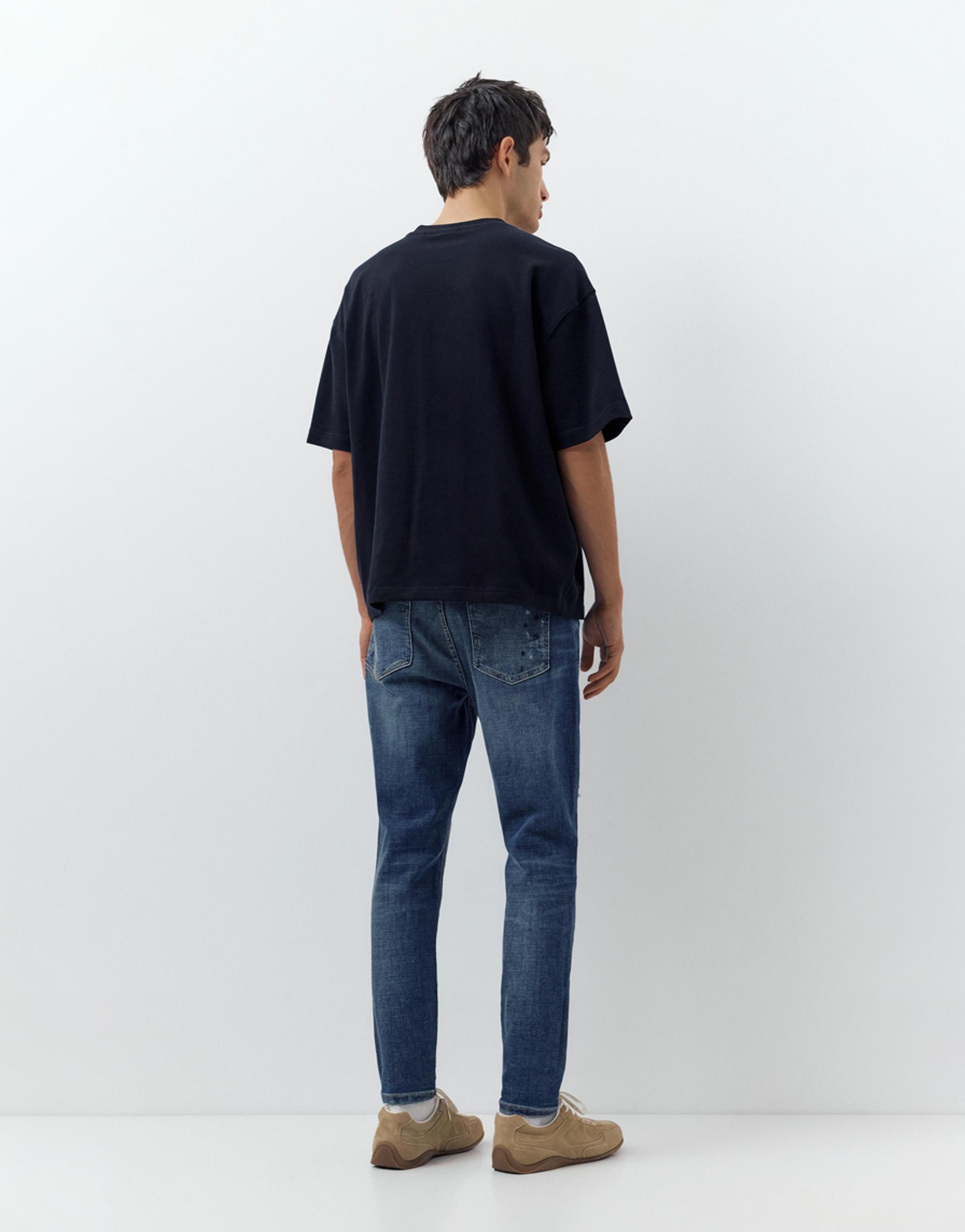 Ripped skinny jeans — Medium blue