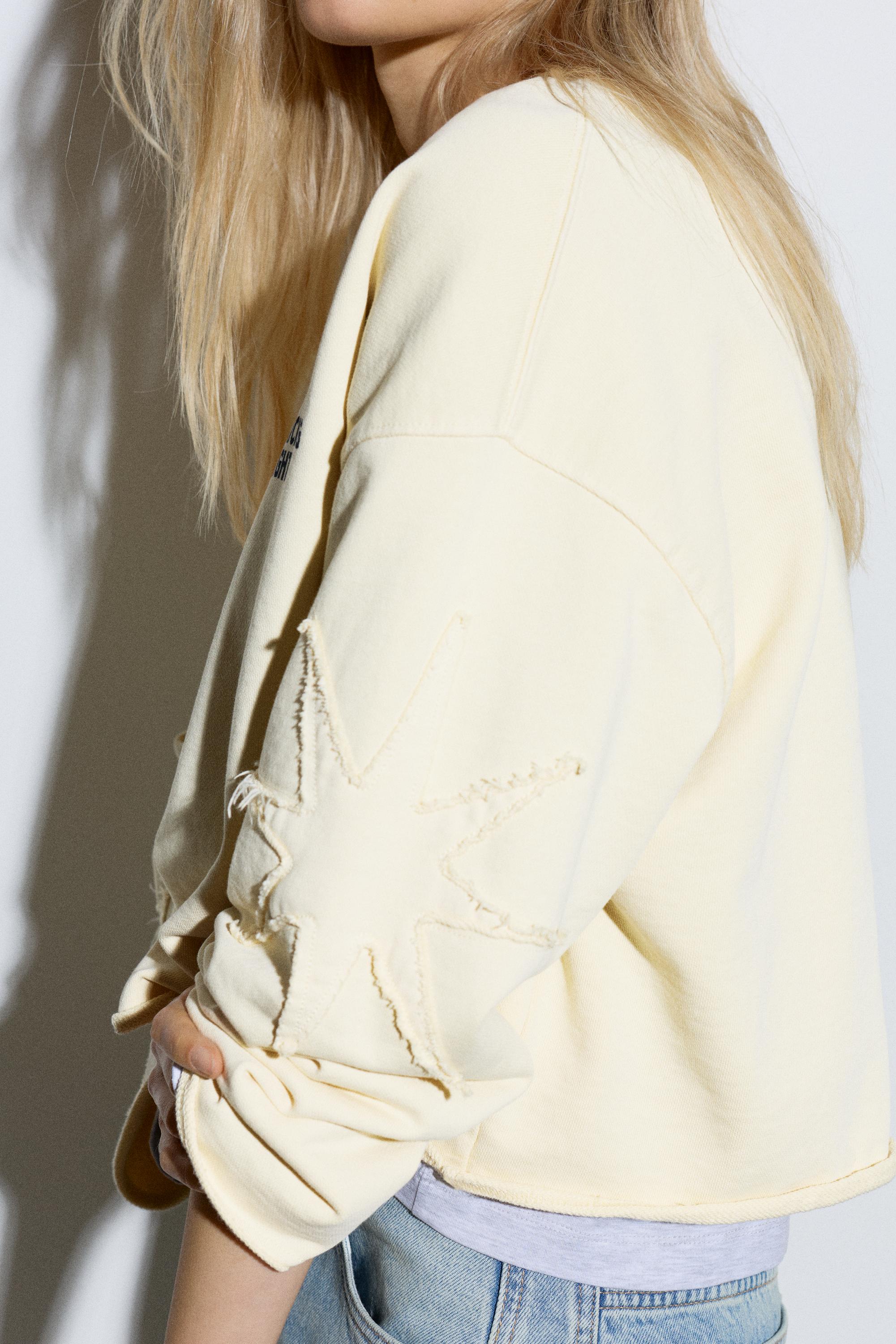 Cropped star graphic sweatshirt — Yellow