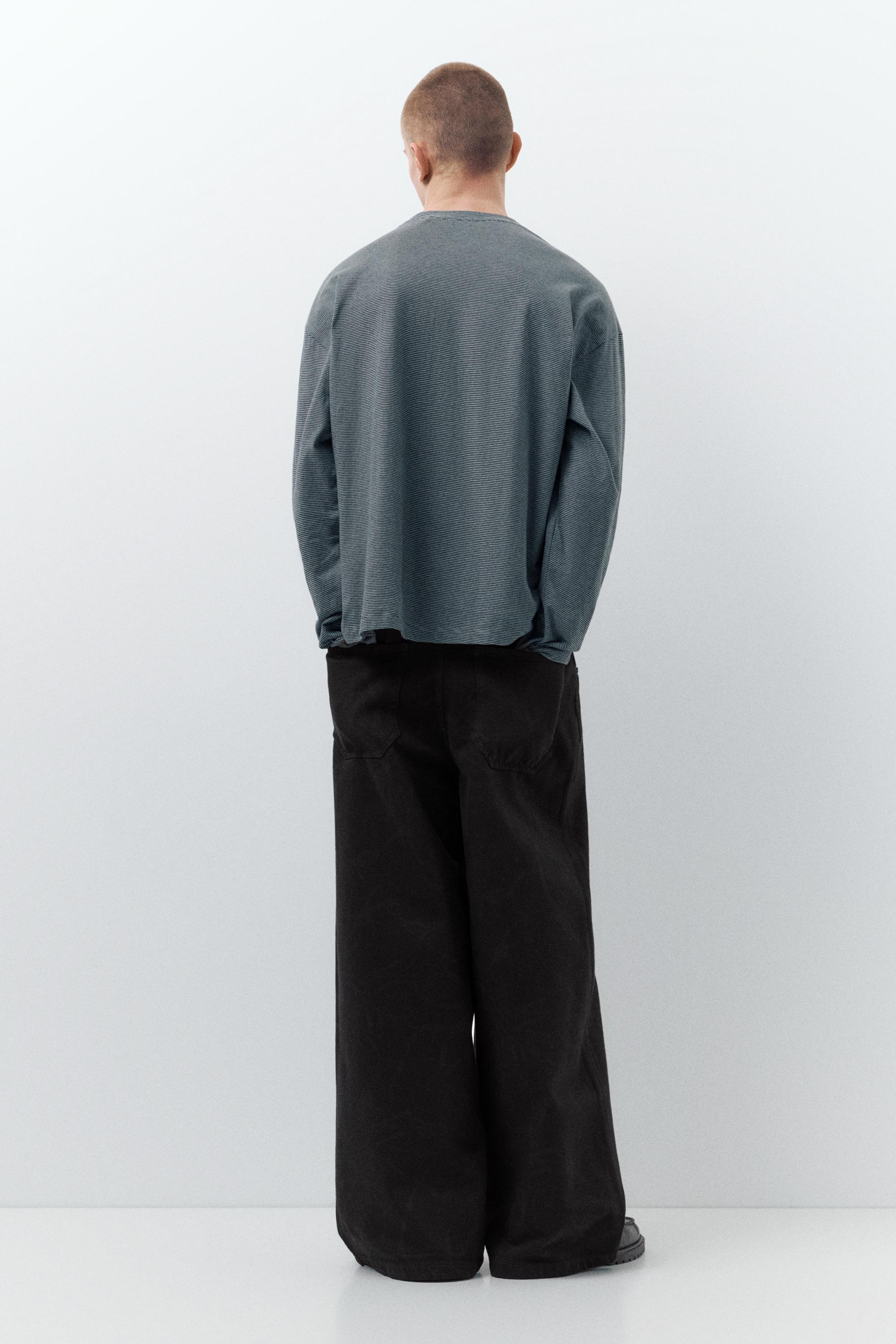 Laser print baggy jeans — Black