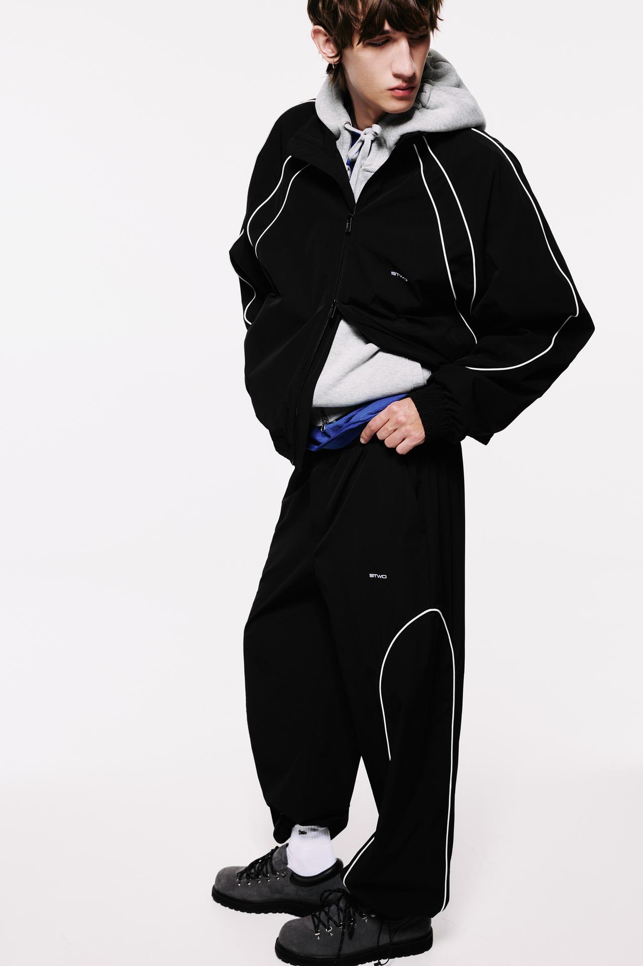 Technical jogger trousers with piping — Black
